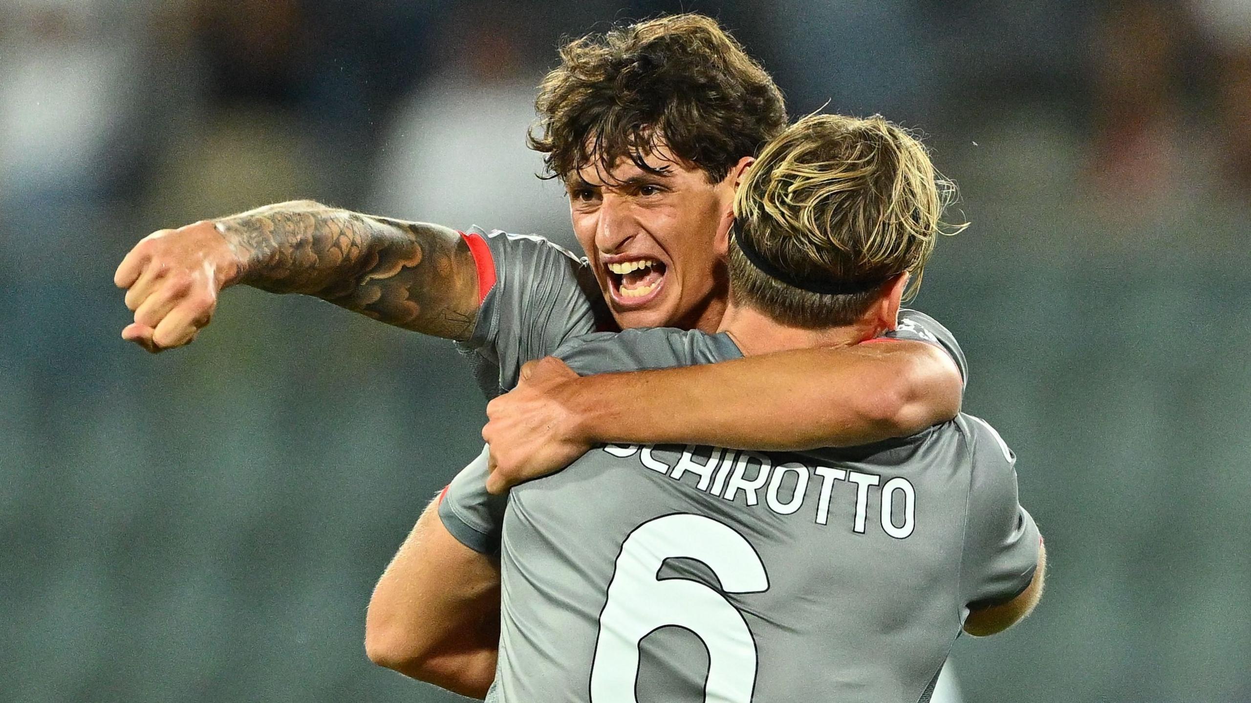 Romano Floriani Mussolini of US Cremonese celebrates with Federico Baschirotto after winning in the Serie A match