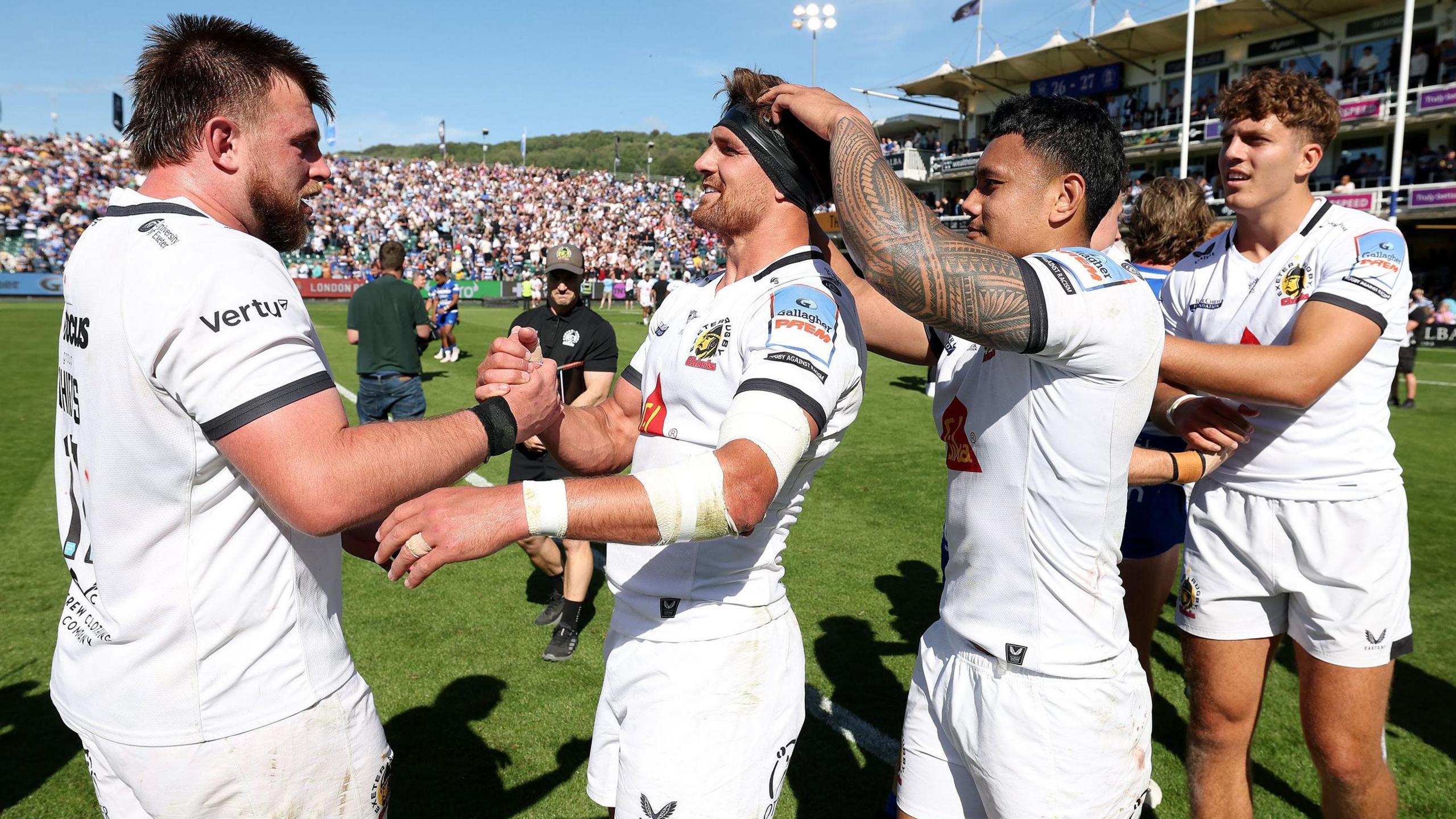 Exeter players celebrate reaching the Prem final