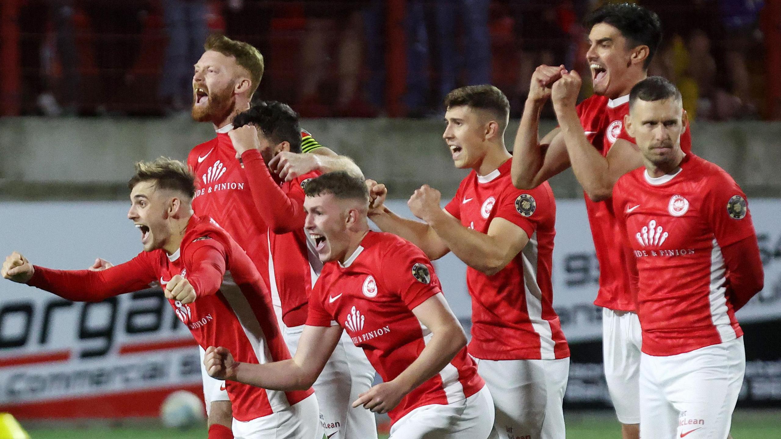 Larne celebrate their win over Lincoln Red Imps