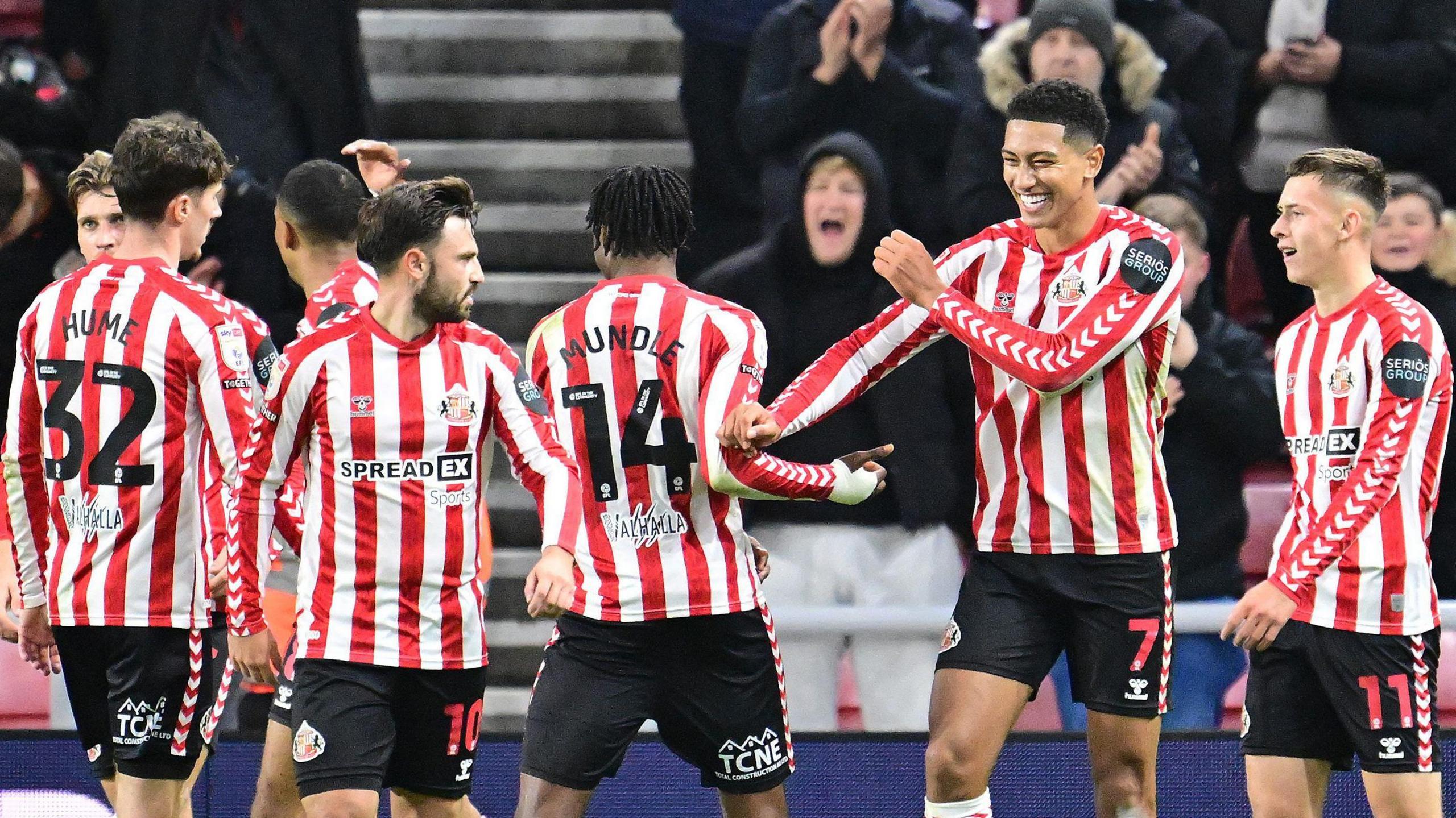 Sunderland players celebrate with Jobe Bellingham after his goal against Derby