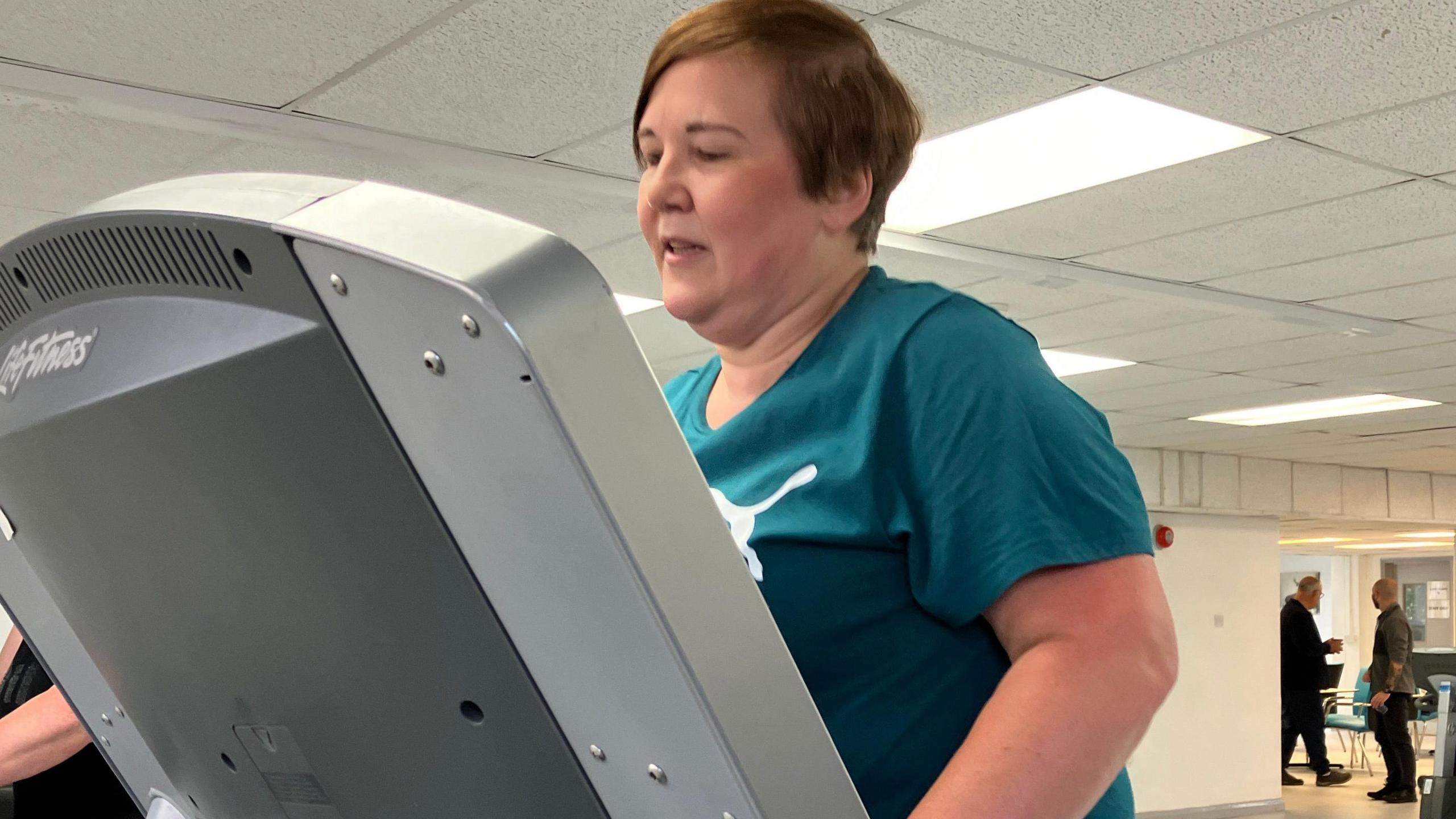 Patient Tracey Griffiths using a treadmill