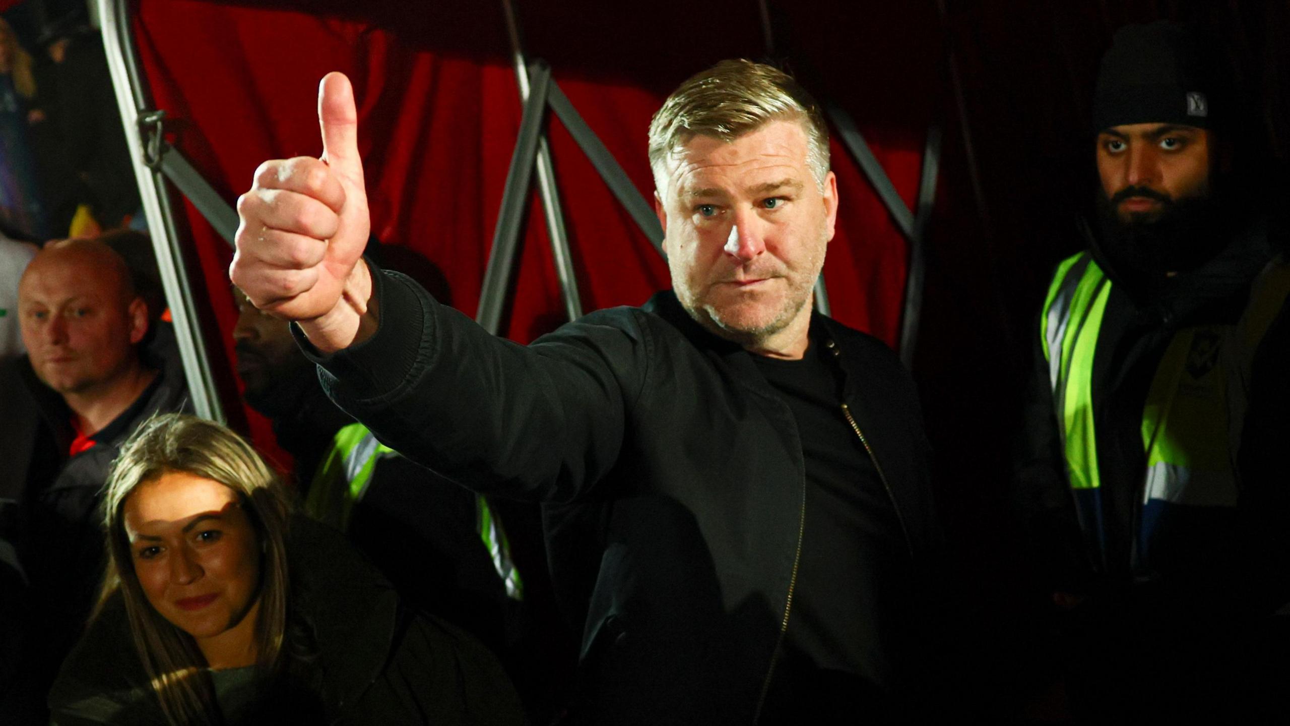 Salford City boss Karl Robinson gives a thumbs up by the tunnel after their play-off semi-final win over Grimsby Town