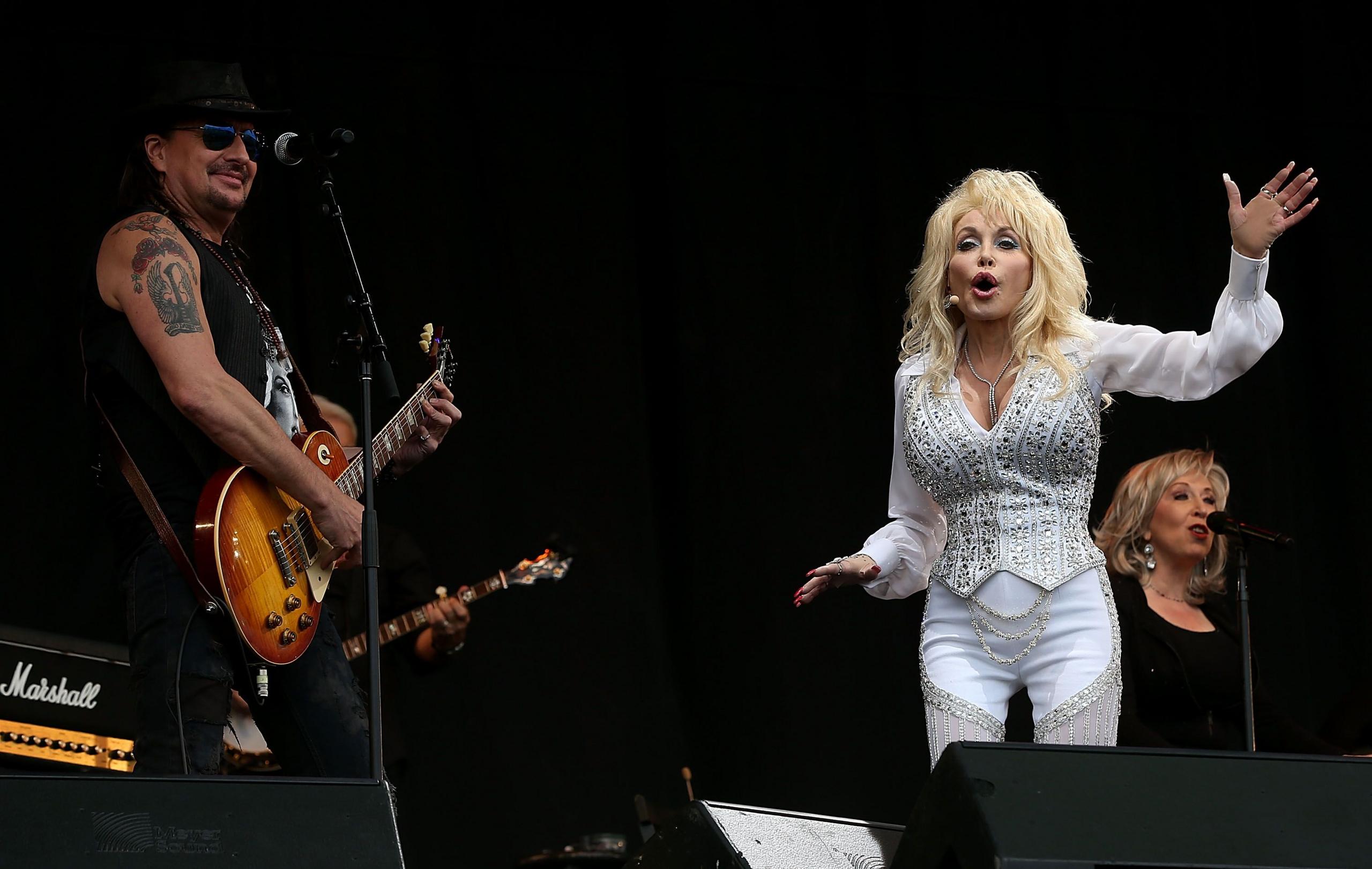 Dolly Parton performs with Richie Sambora from Bon Jovi at the Glastonbury Festival