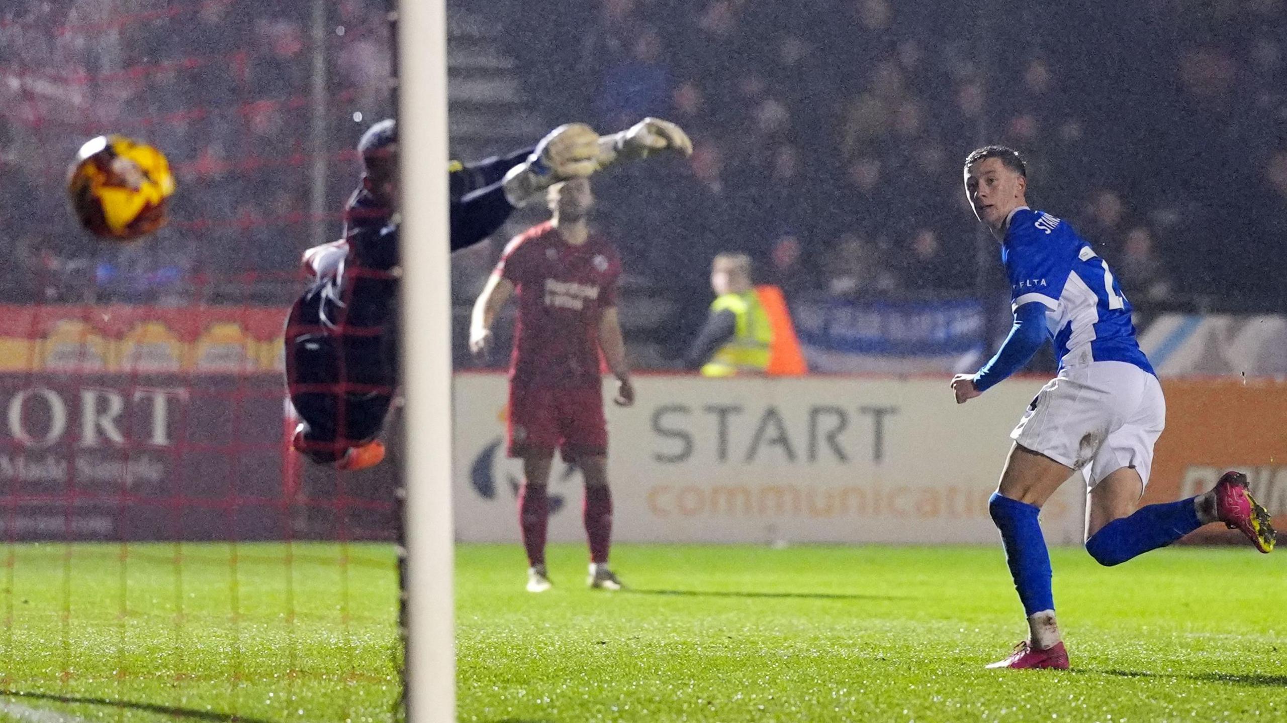 Jay Stansfield heads beyond Jojo Wollacott to score for Birmingham