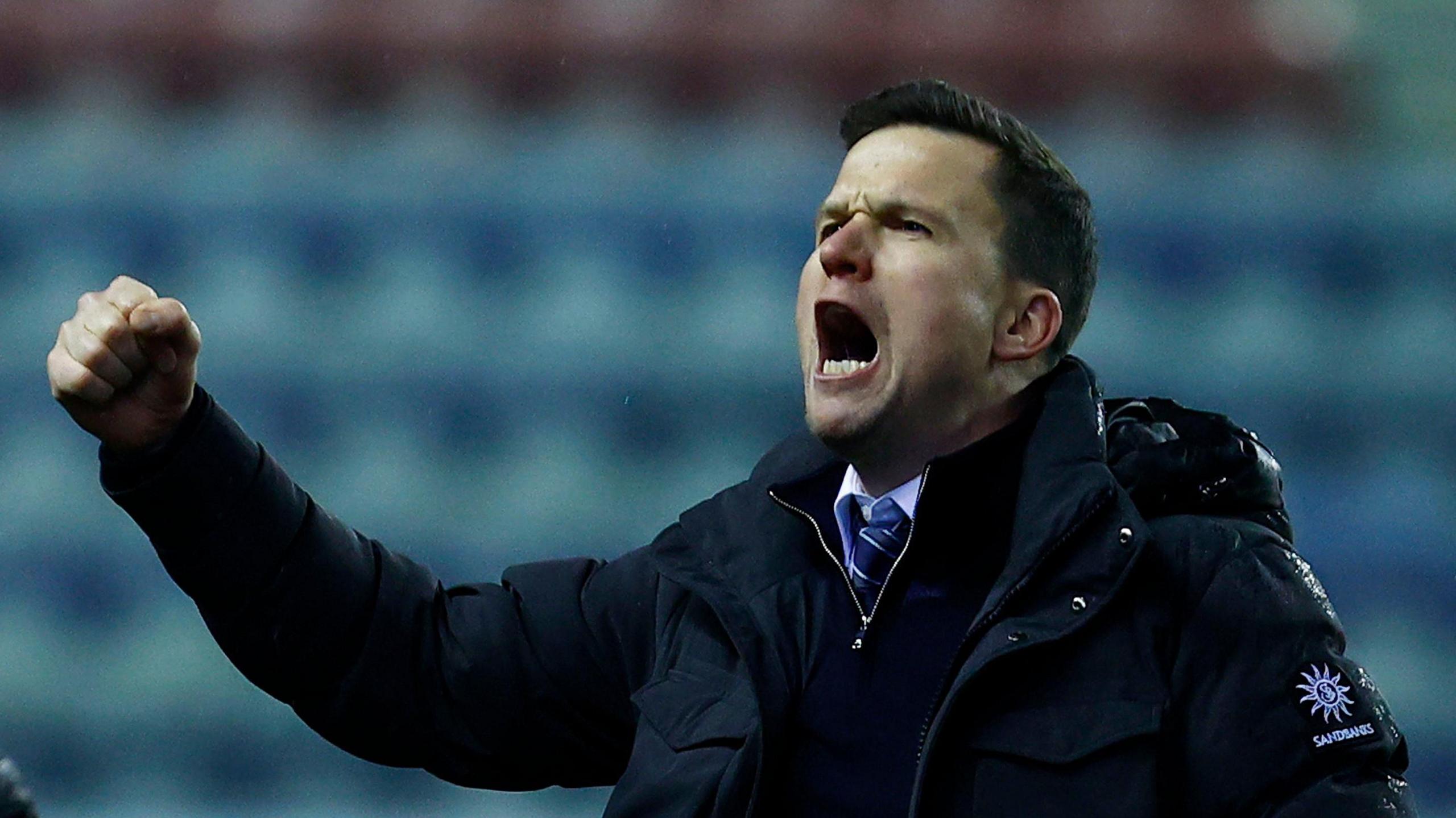 Gary Caldwell celebrates after the 1-0 win over Luton