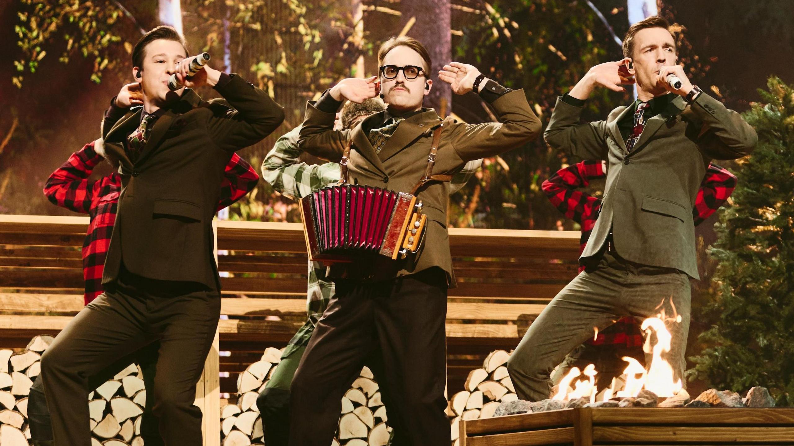 KAJ perform in front of a fake sauna at the Eurovision Song Contest 2025