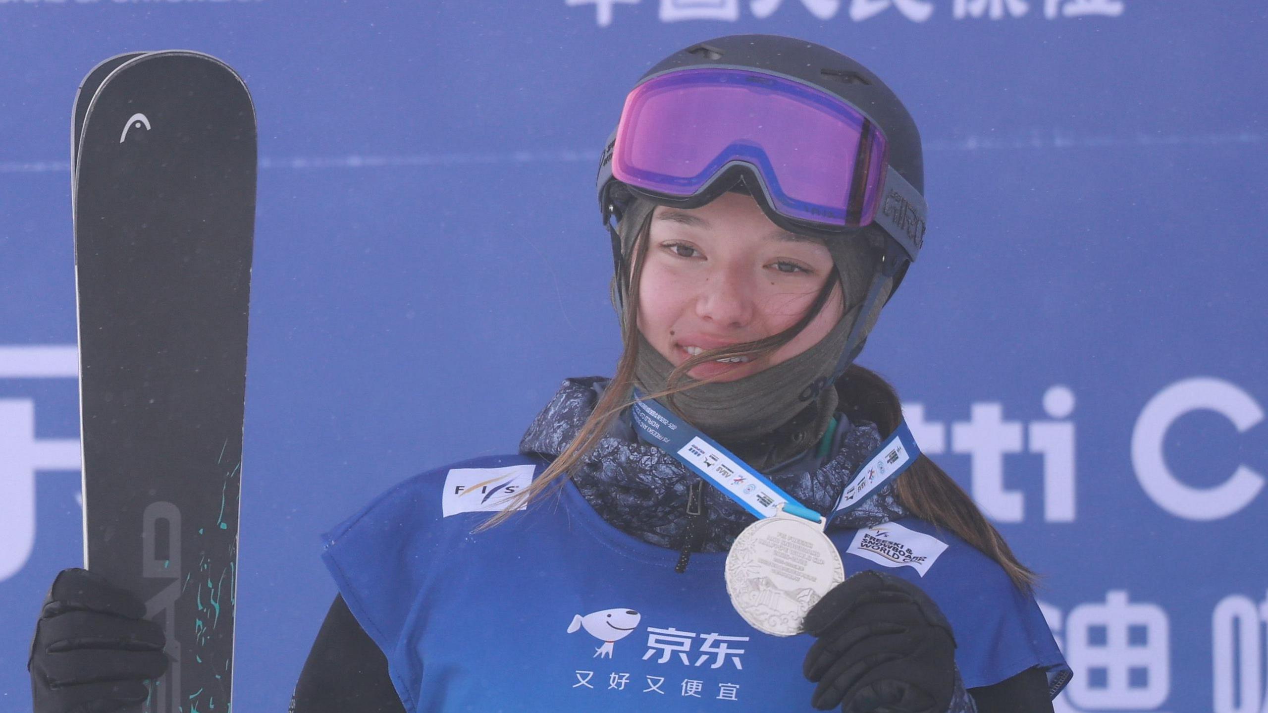 Great Britain's Zoe Atkin celebrates winning silver at a World Cup event in China