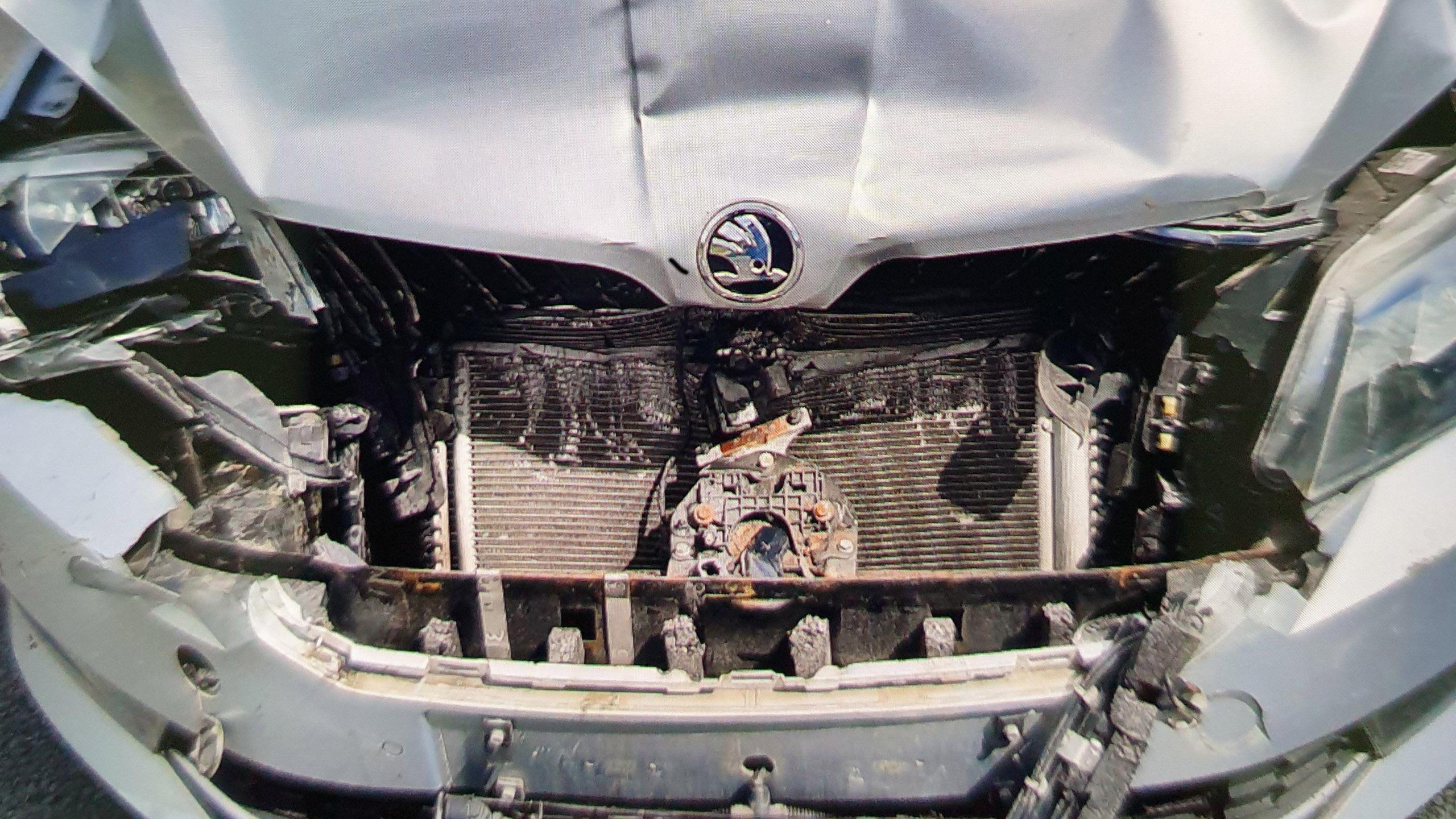 the crushed bonnet of a car