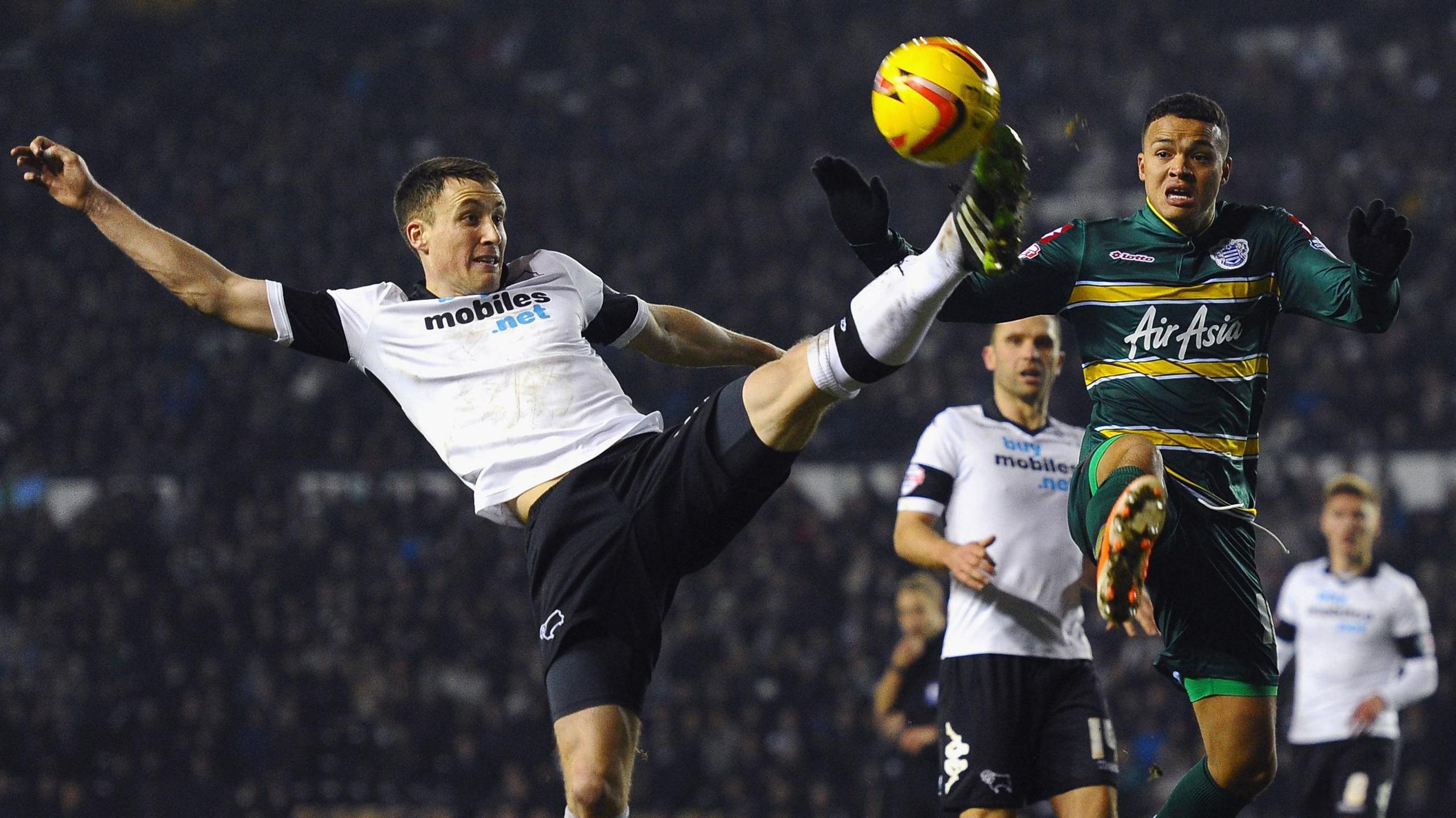 Craig Forsyth challenges for the ball against QPR's Jermaine Jenas in 2014 while Derby team-mate, and future Rams boss, John Eustace watches on in the background