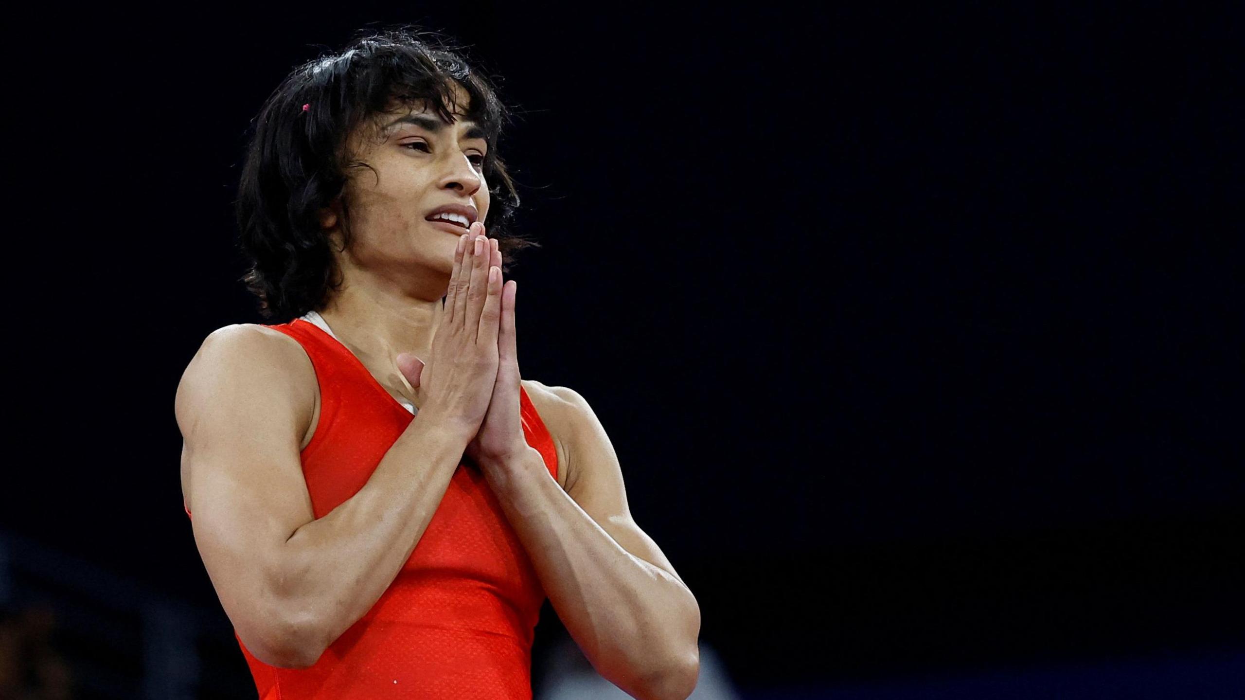 Vinesh Phogat of India reacts after winning the match against Yusneylis Guzman Lopez of Cuba