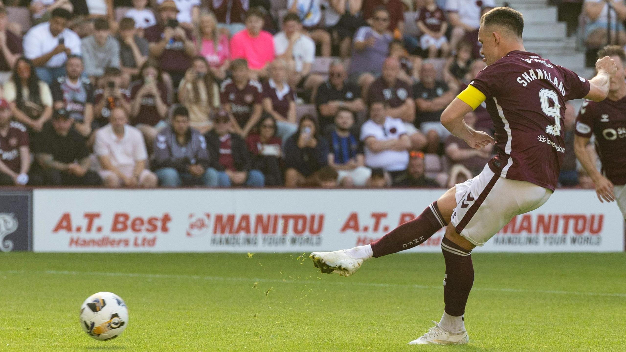 Lawrence Shankland scores a penalty for Hearts against Dunfermline Athletic