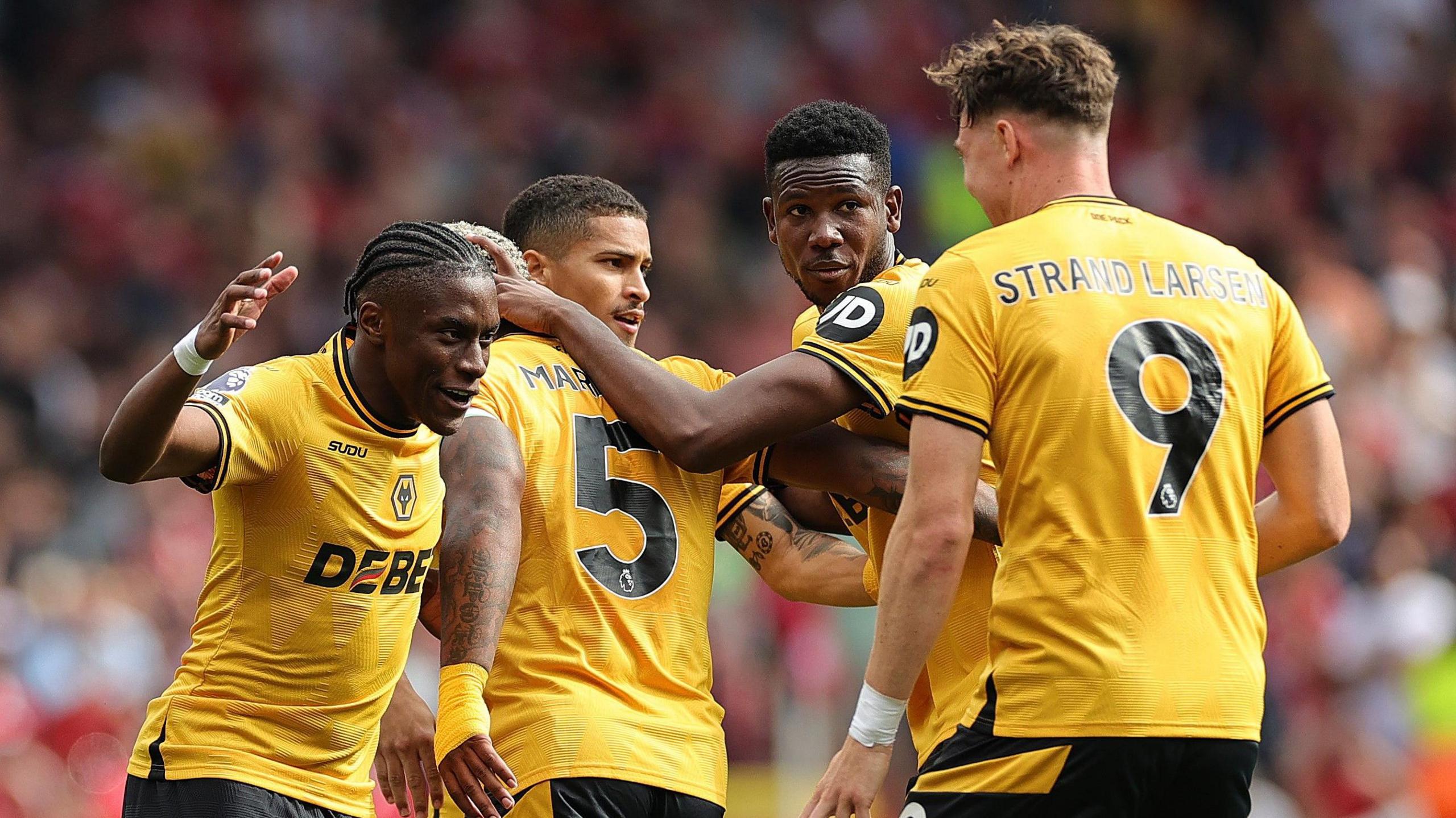 Wolves players, including Mario Lemina, Joao Gomes and Jorgen Strand Larsen celebrate their goal in the 1-1 draw at Nottingham Forest.