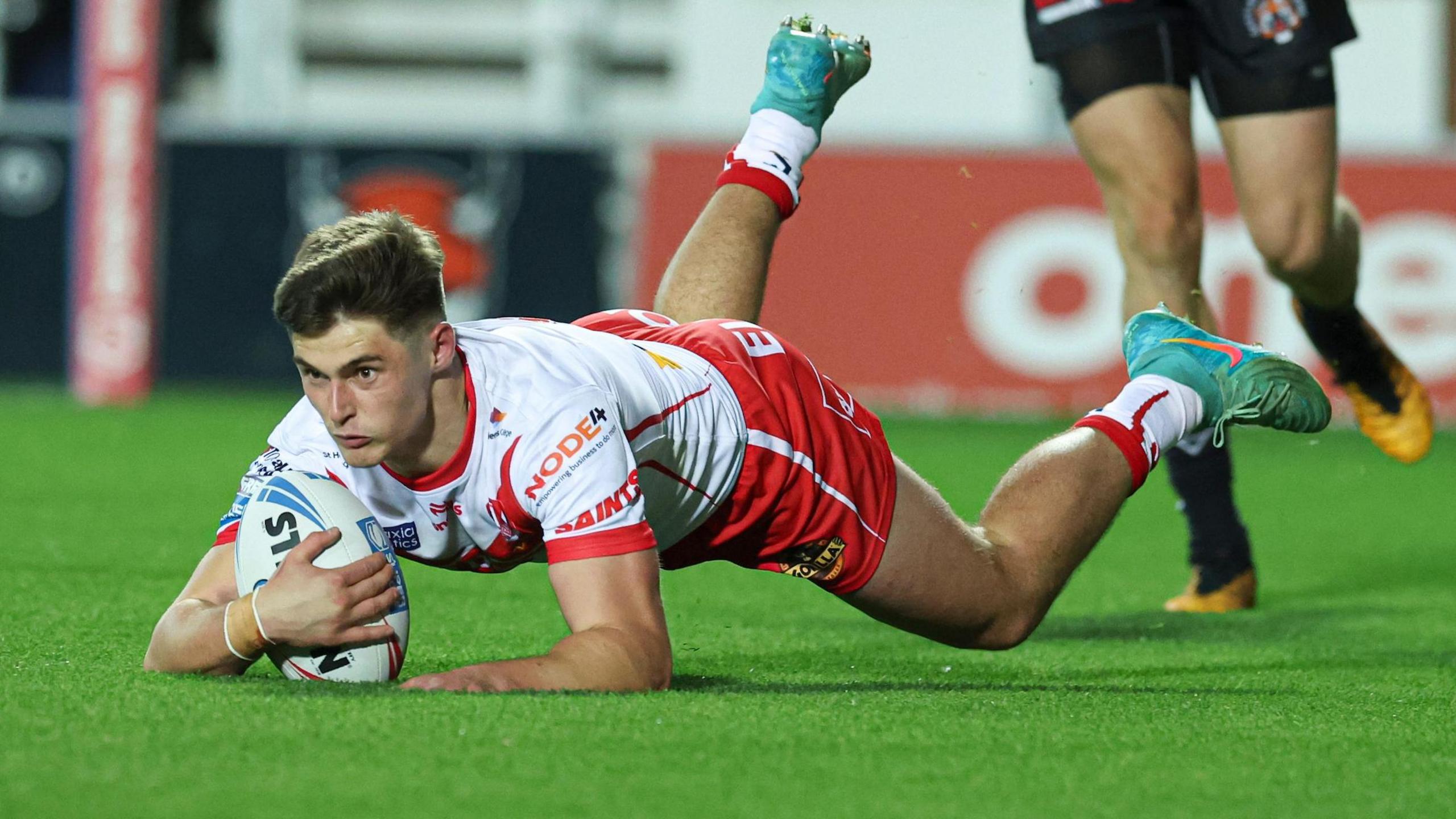 St Helens' Jon Bennison scores a try