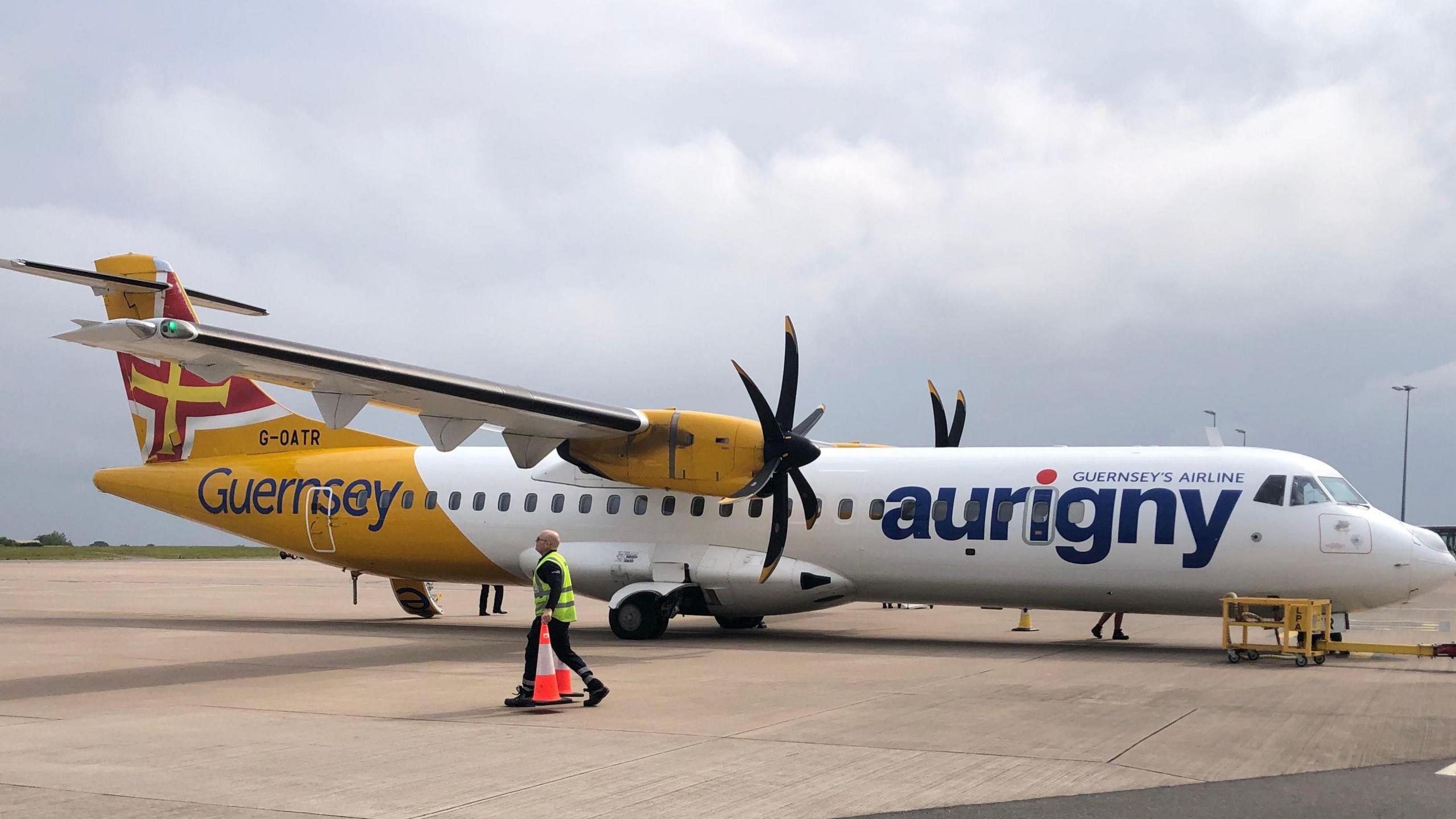 An Aurigny ATR plane on the runway at Guernsey Airport