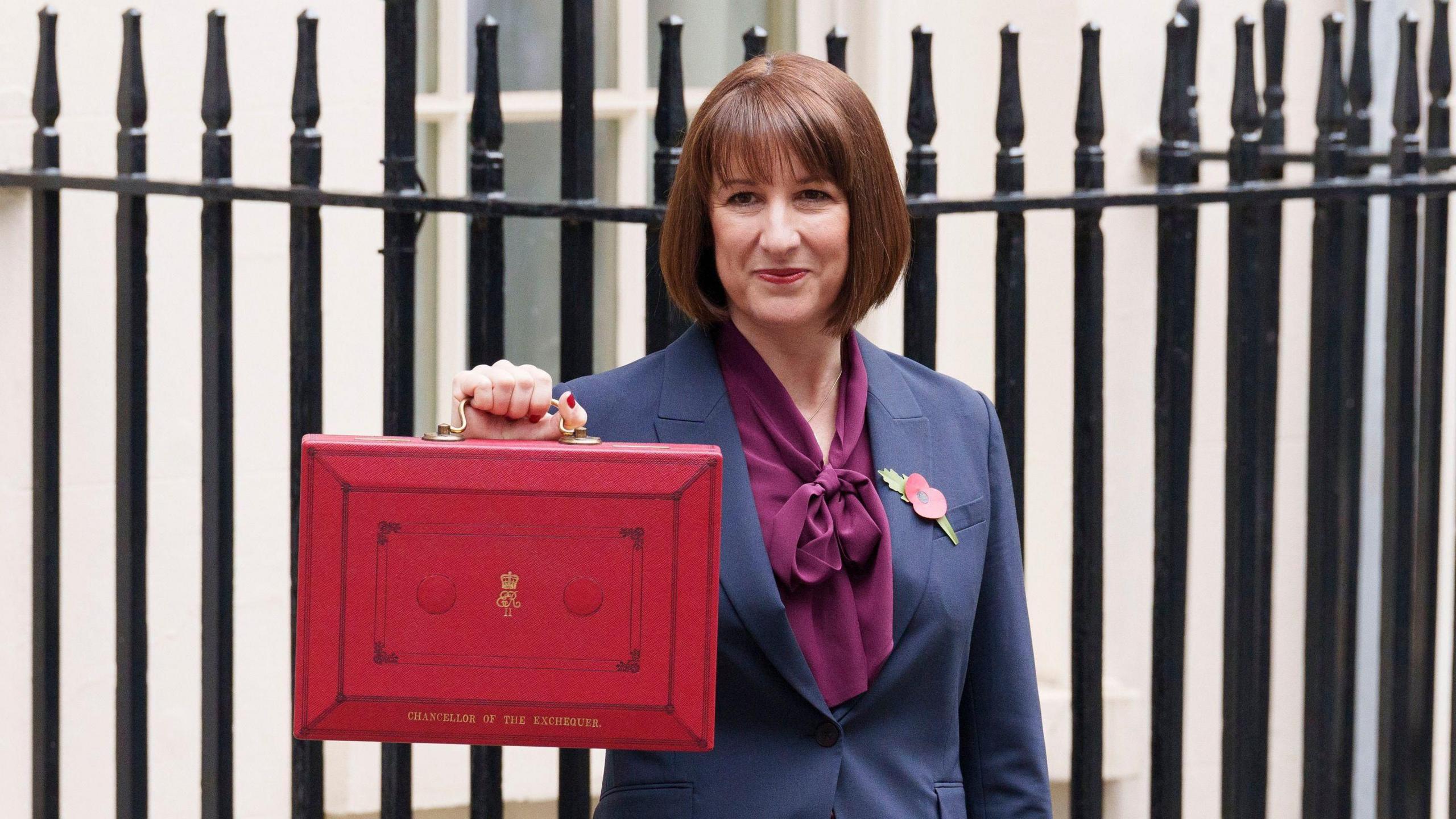 Rachel Reeves holding the red Budget briefcase
