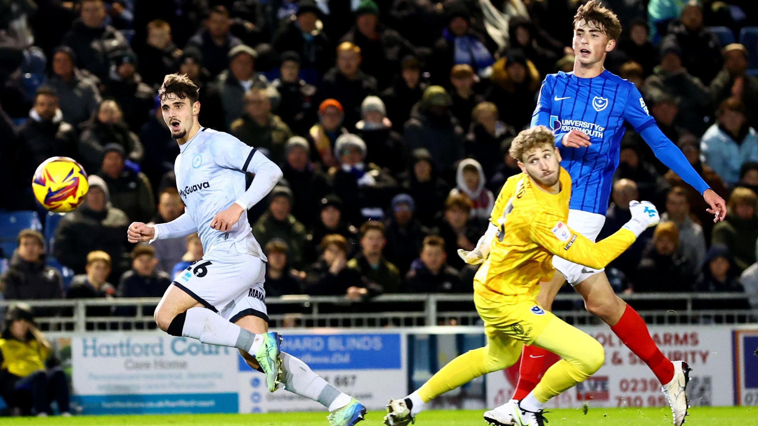 Mihailo Ivanovic places his finish past Portsmouth goalkeeper Nicolas Schmid