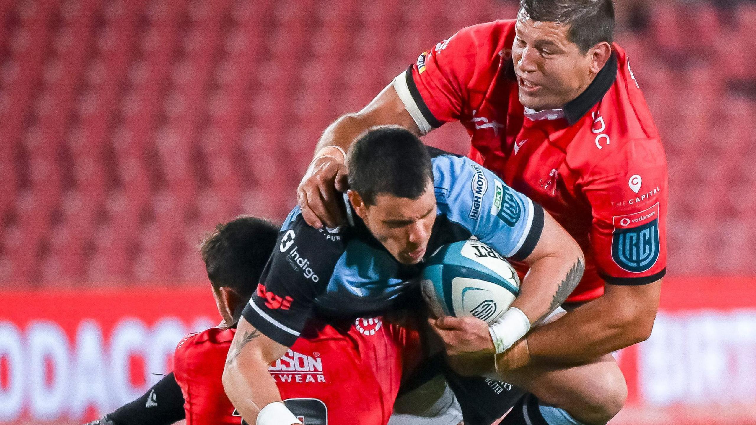 Gonzalo Bertranou of Cardiff is tackled by Lions