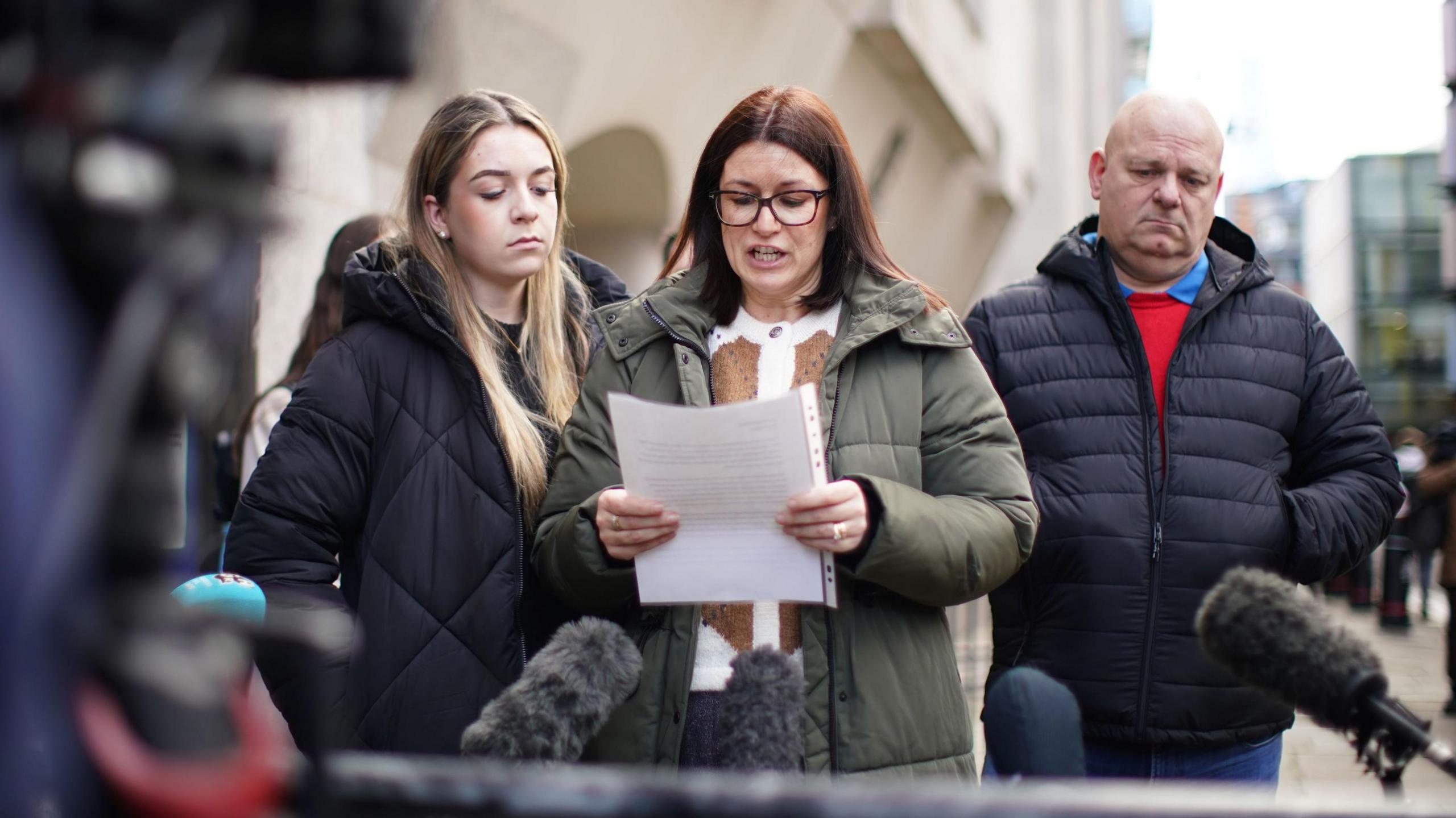 Casey Hoath, step-grandmother Kerrie Hoath, and grandfather Jason Hoath, speaking outside the Old Bailey