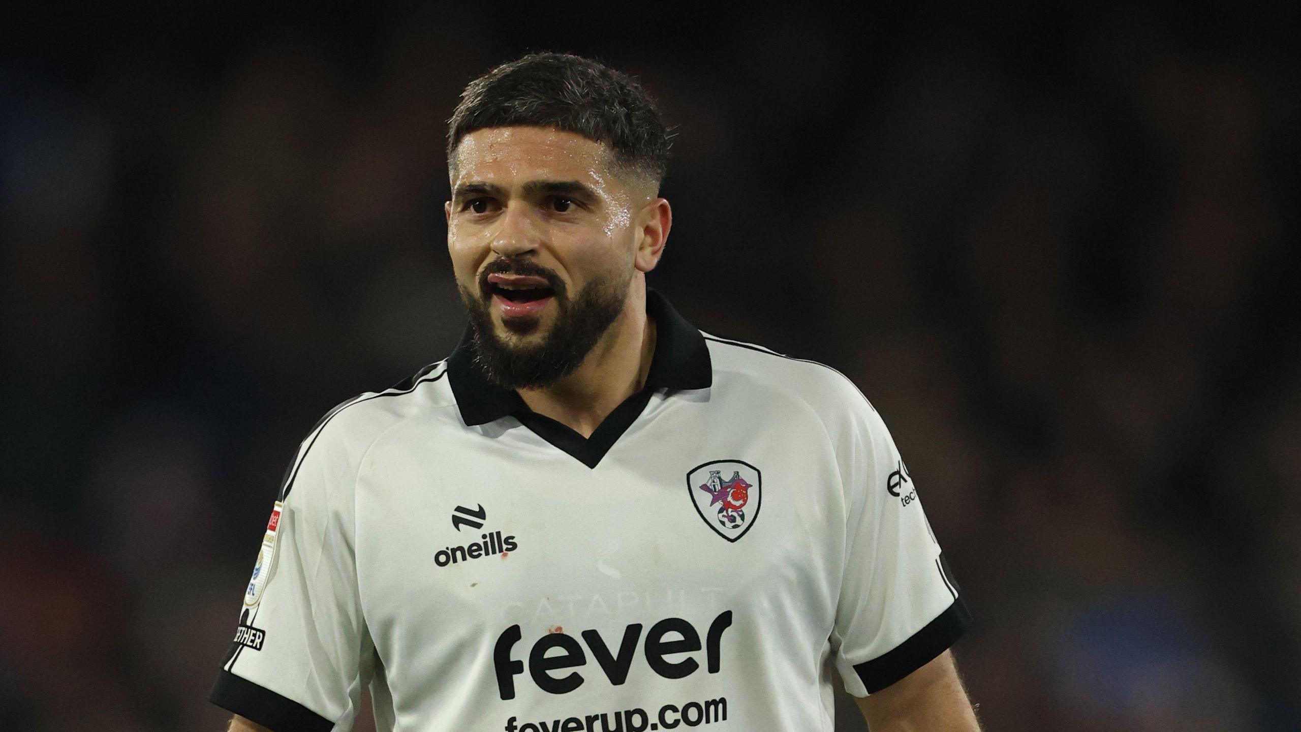 A close up of Sam Morsy in a white Bristol City shirt while playing for the club against Ipswich Town in January