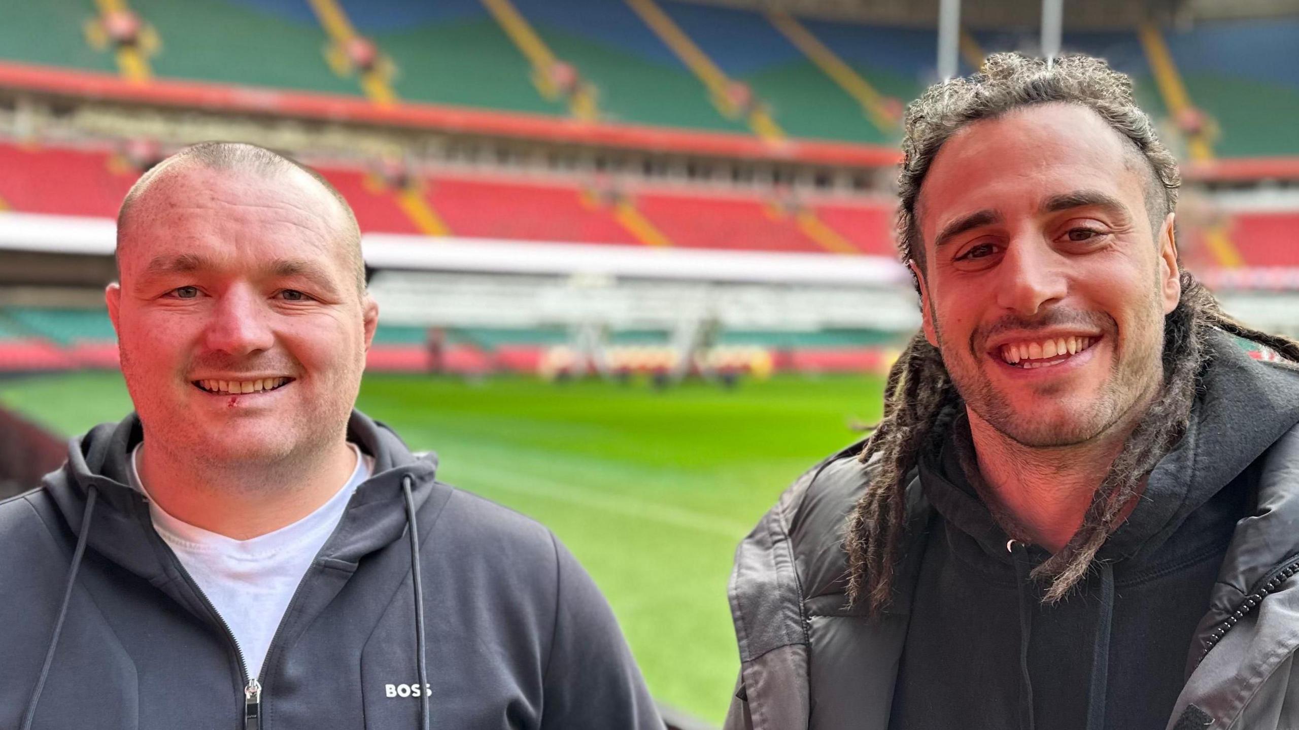 Ken Owens and Josh Navidi smiling for a photo at the Principality Stadium 