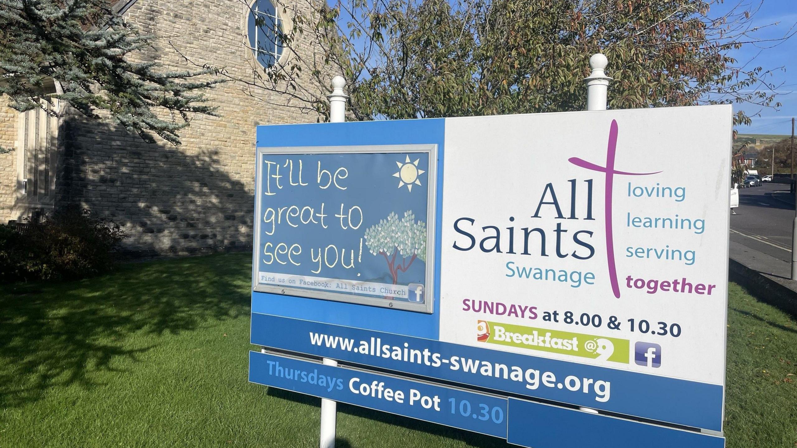 A sign outside All Saints Church Swanage