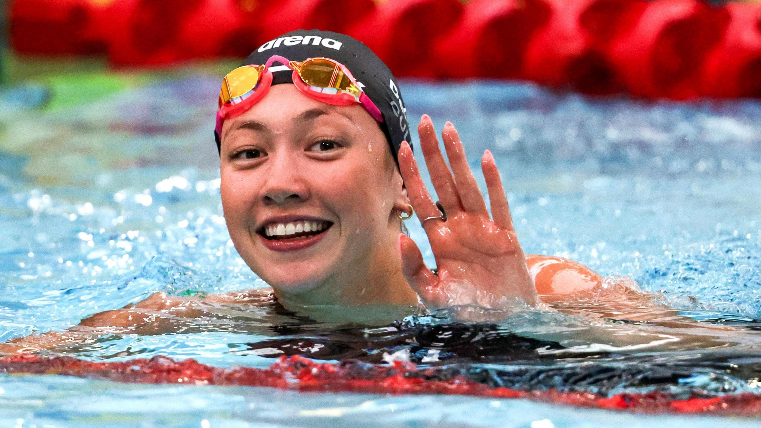 Lottie Cullen celebrates her victory in Bangor