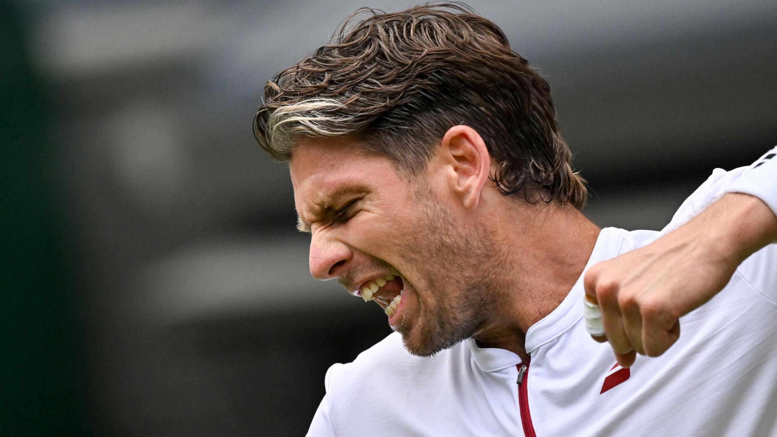 Cameron Norrie celebrates beating Nicolas Jarry at Wimbledon