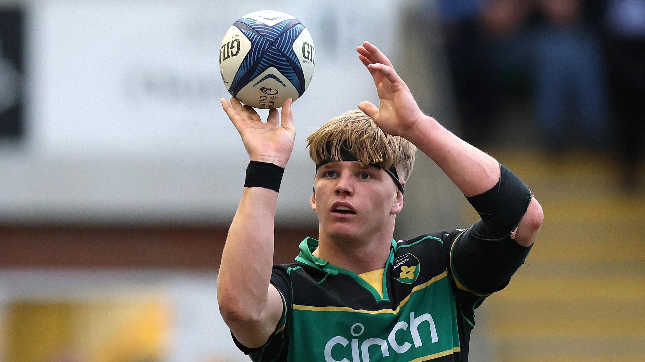 Henry Pollock celebrates a try against Castres