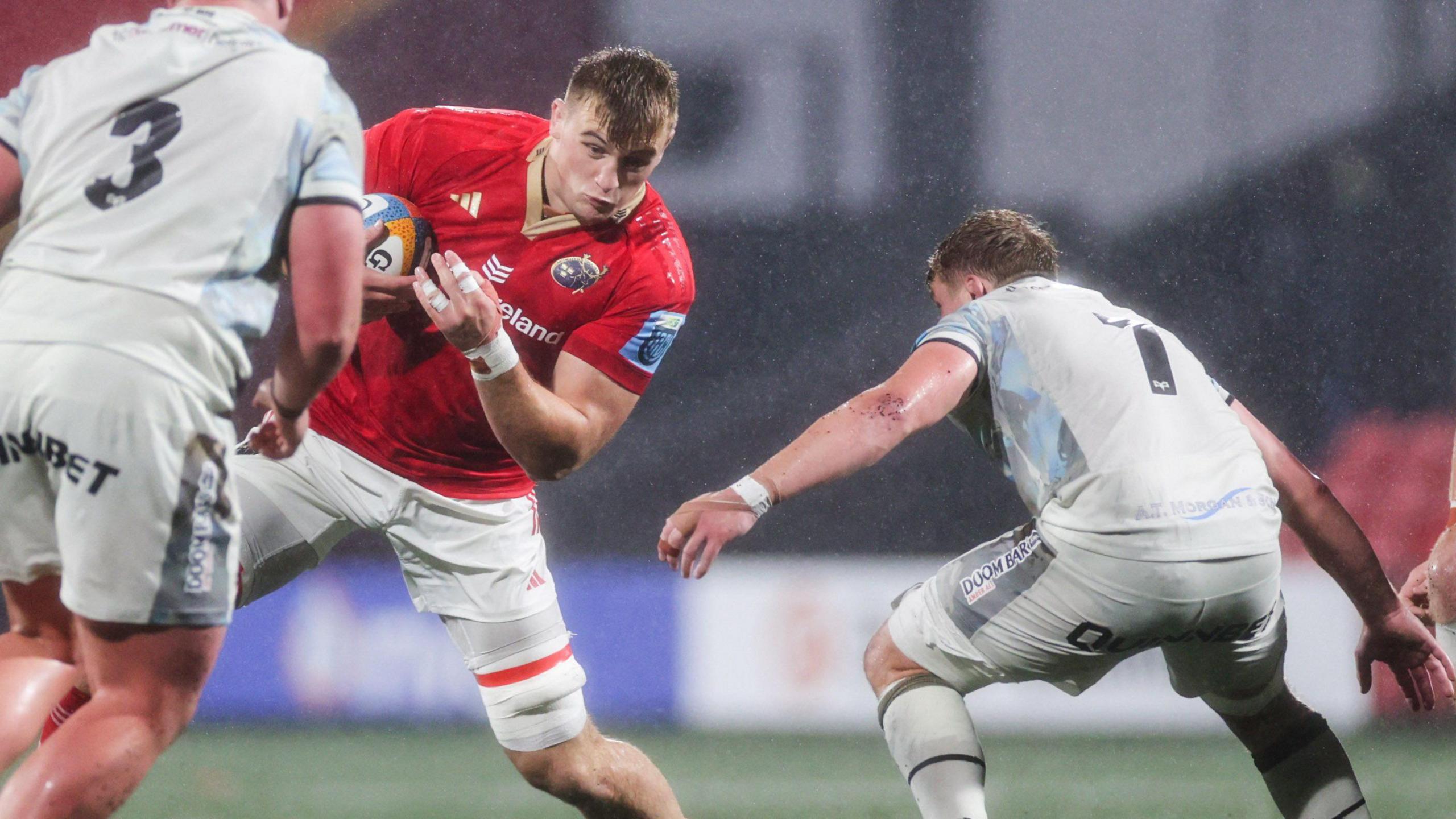 Munster's Gavin Coombes and Jac Morgan of Ospreys