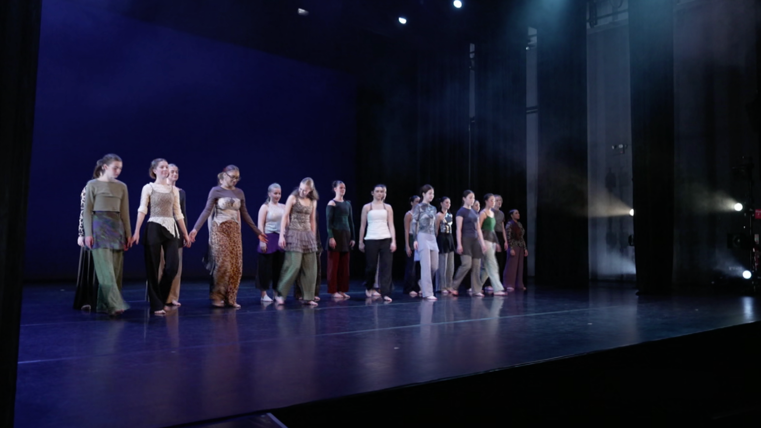 Students on a stage at Trinity Laban
