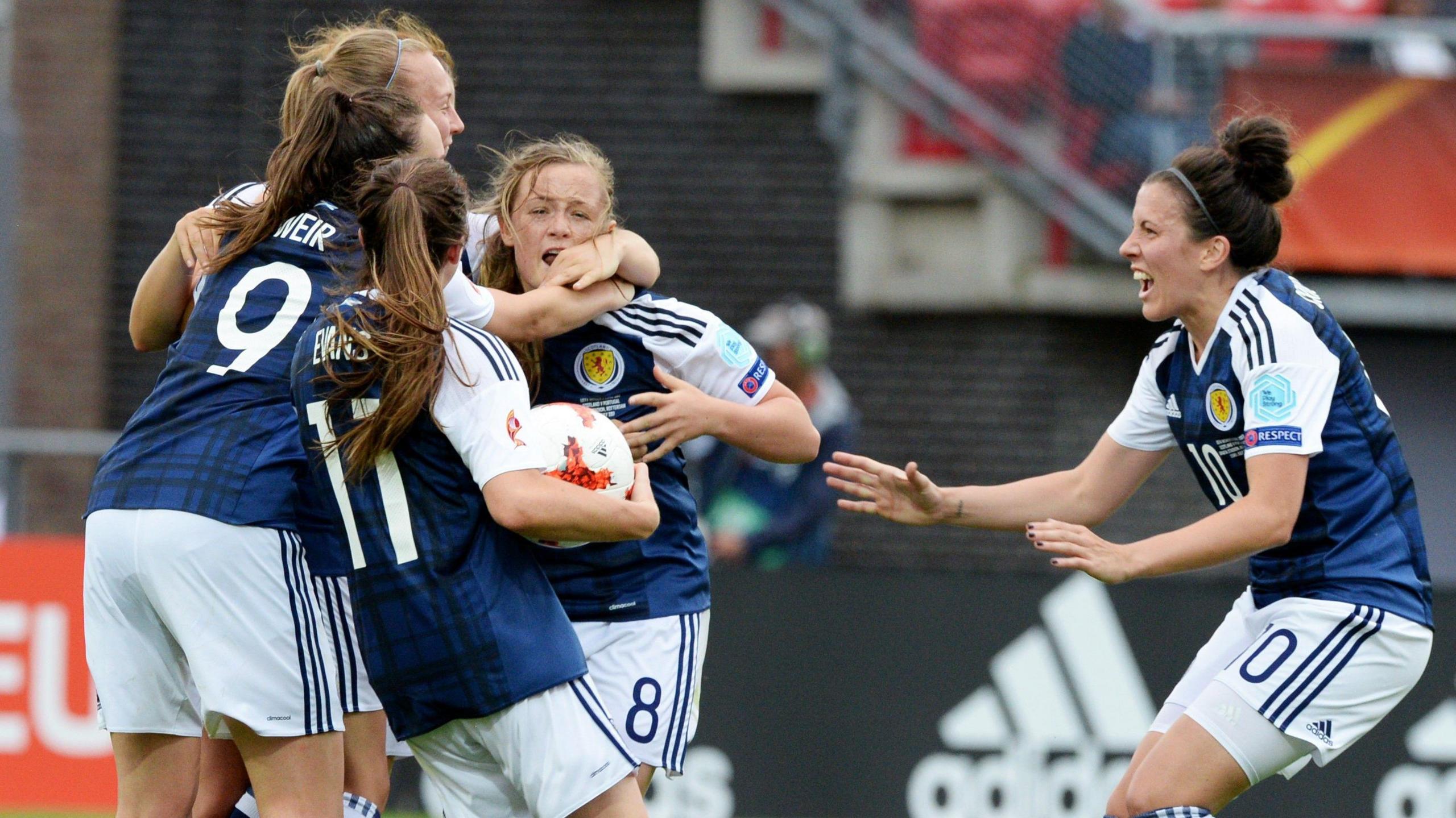 Caroline Weir, Lisa Evans and Leanne Crichton celebrate with Erin Cuthbert as she scores for Scotland against Portugal in 2017