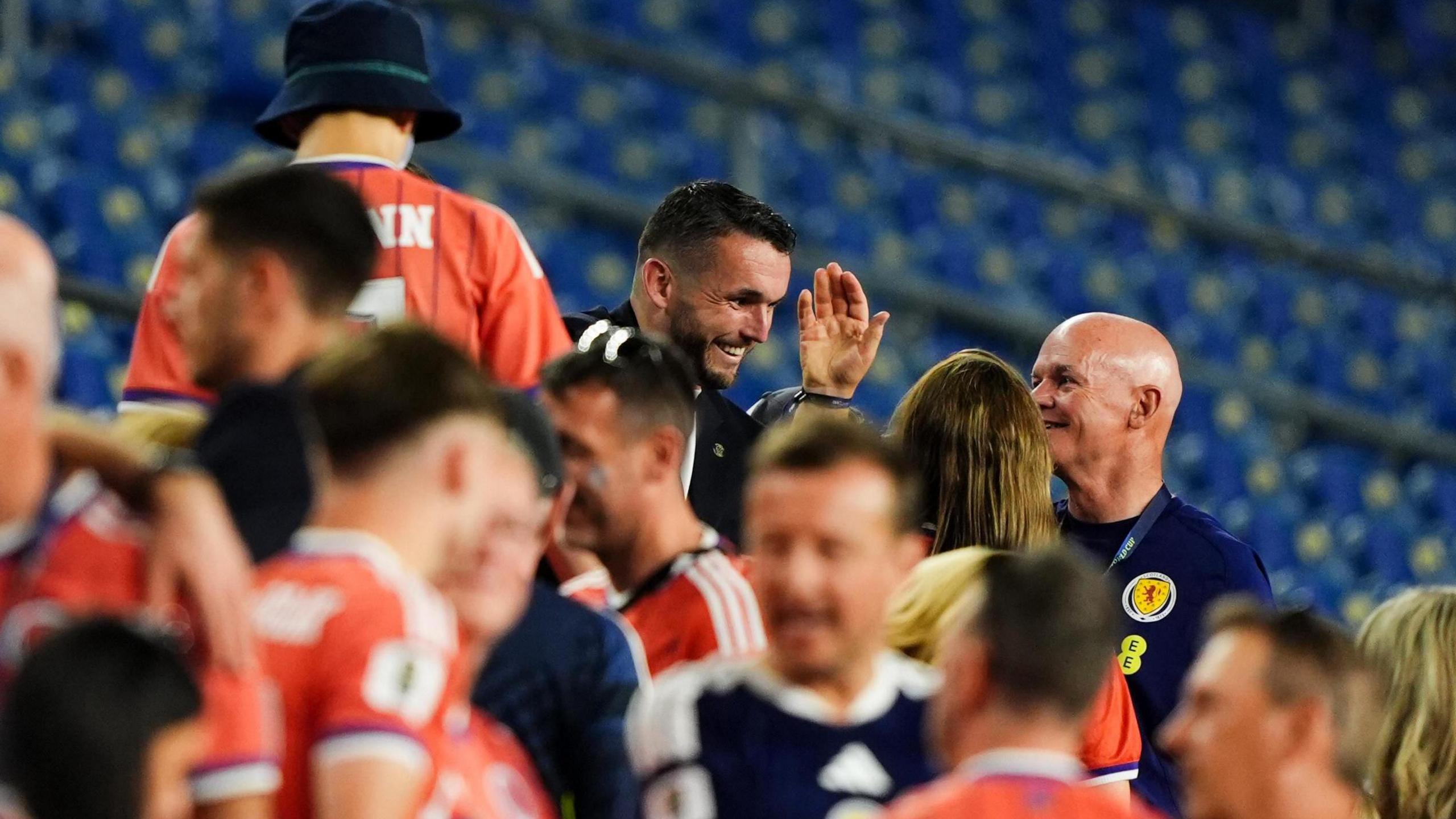 John McGinn all smiles with some friends and family post-match