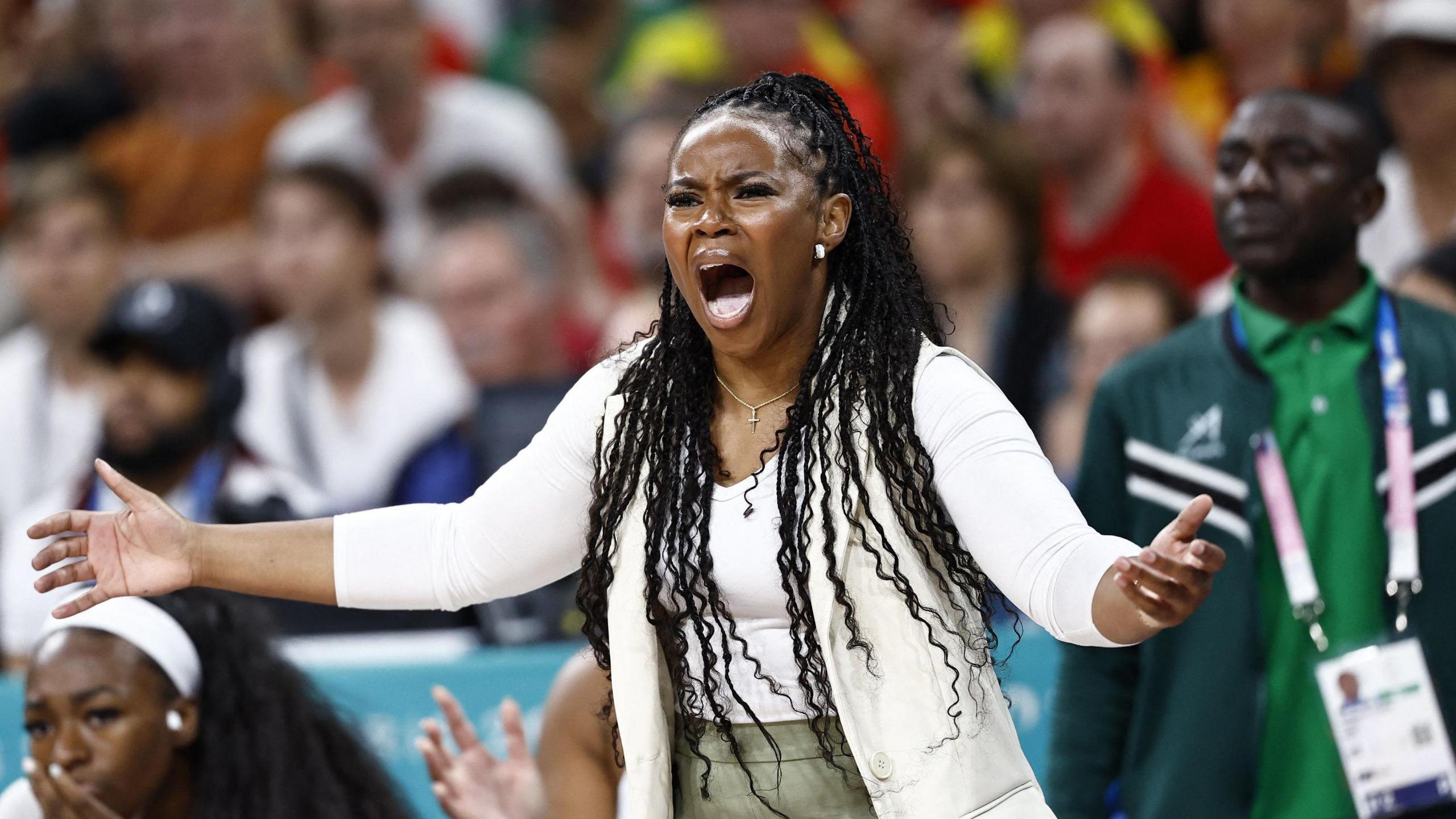 Nigeria coach Rena Wakama gestures on the sidelines during a game at Paris 2024