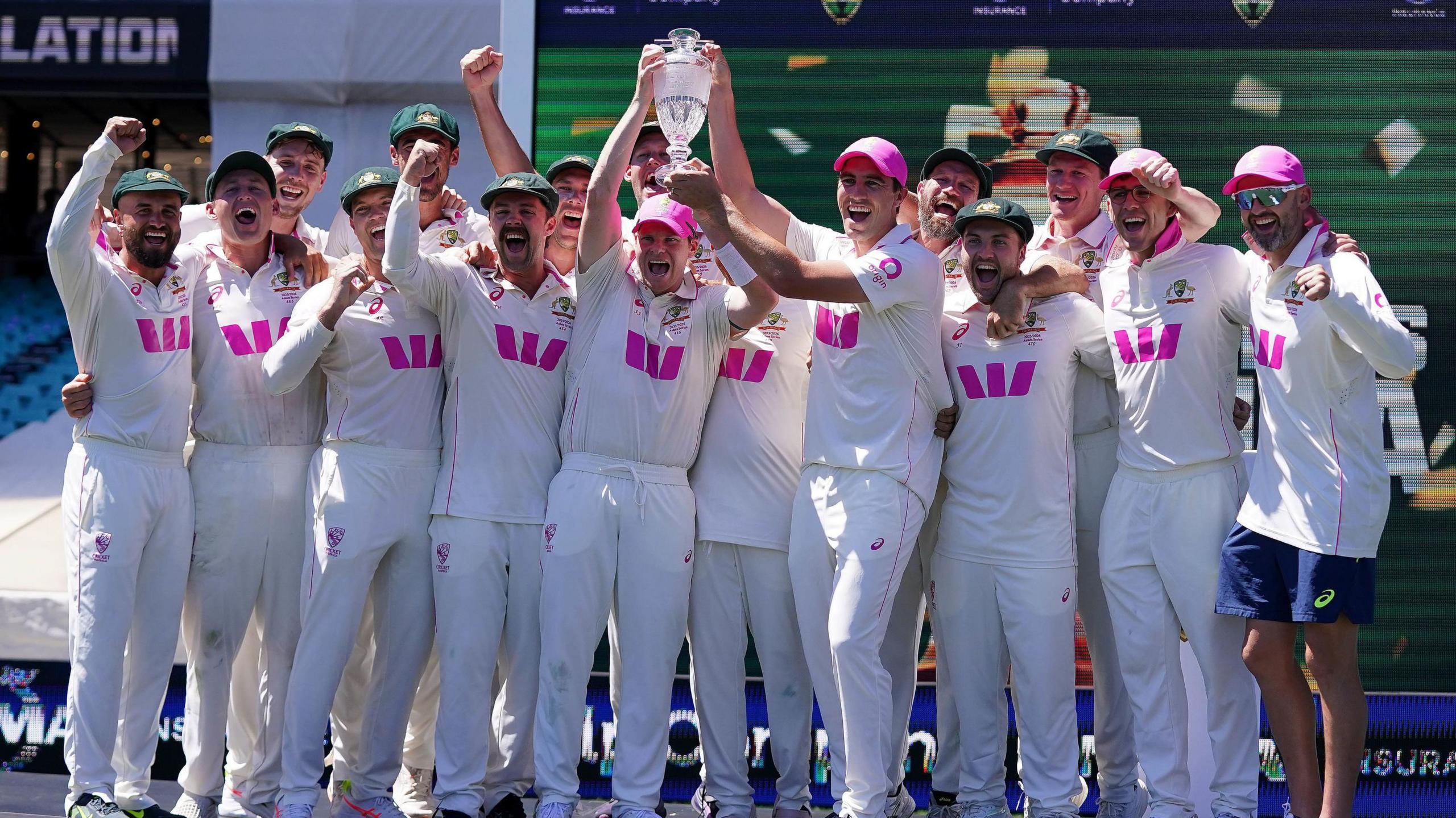 Australia celebrate with the Ashes series crystal trophy
