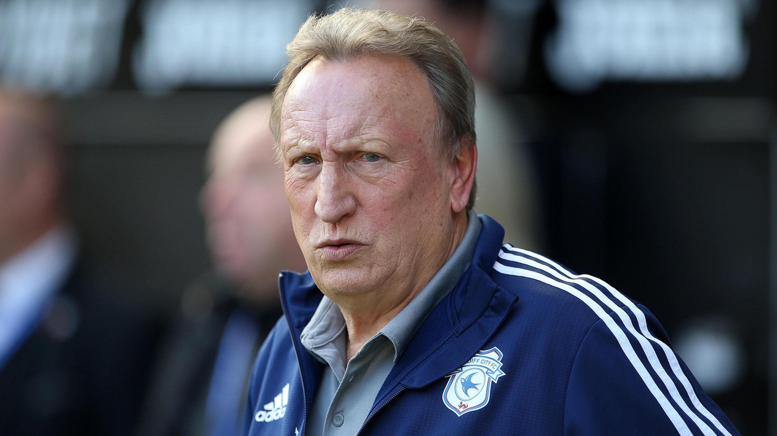 Neil Warnock looks on from the touchline during his time as Cardiff City manager