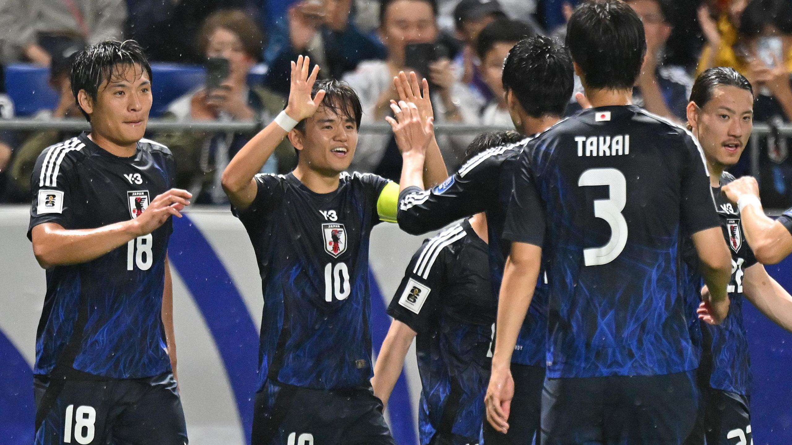 Japan players celebrate