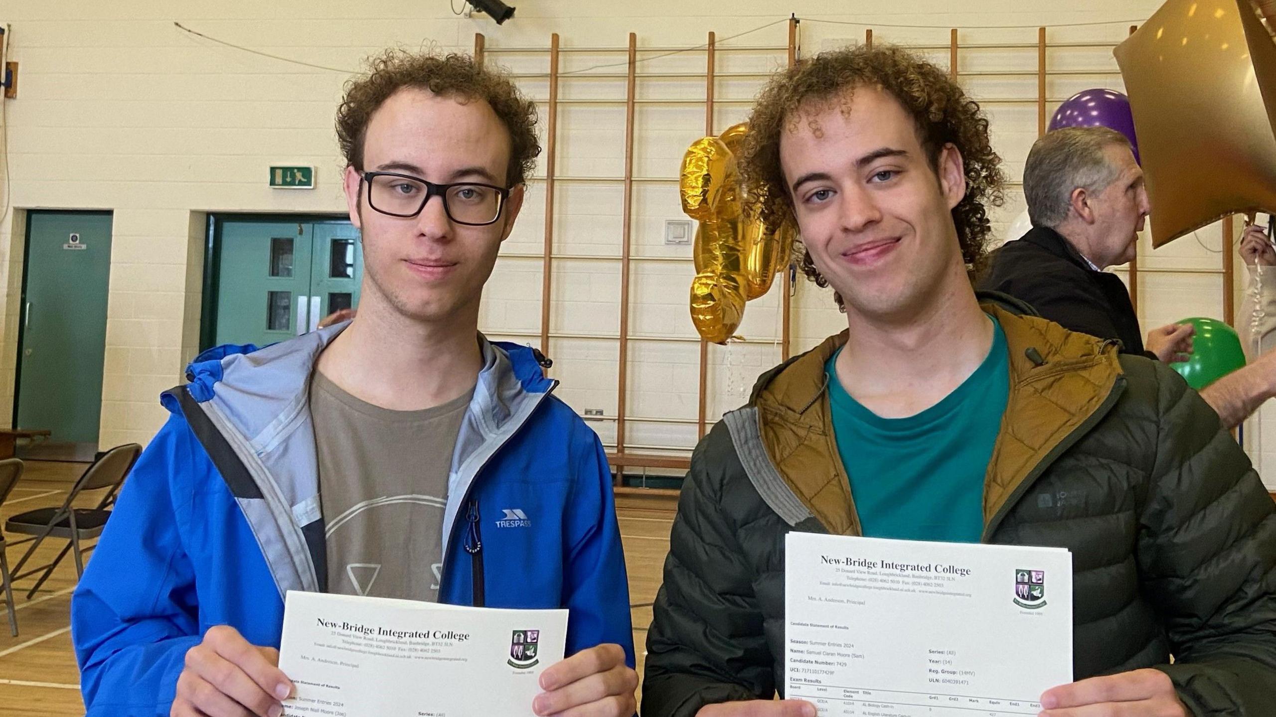 Twins Sam and Joe holding their results at New-Bridge Integrated College in Loughbrickland