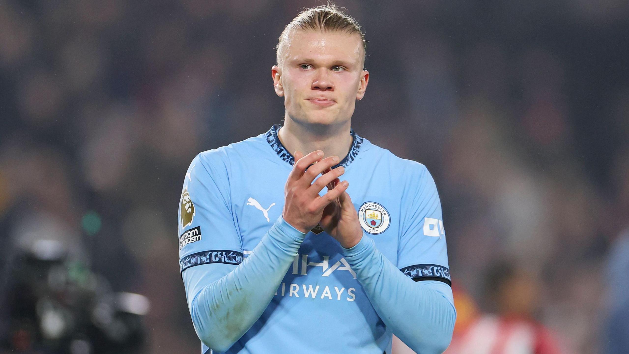 Erling Haaland claps the Manchester City fans