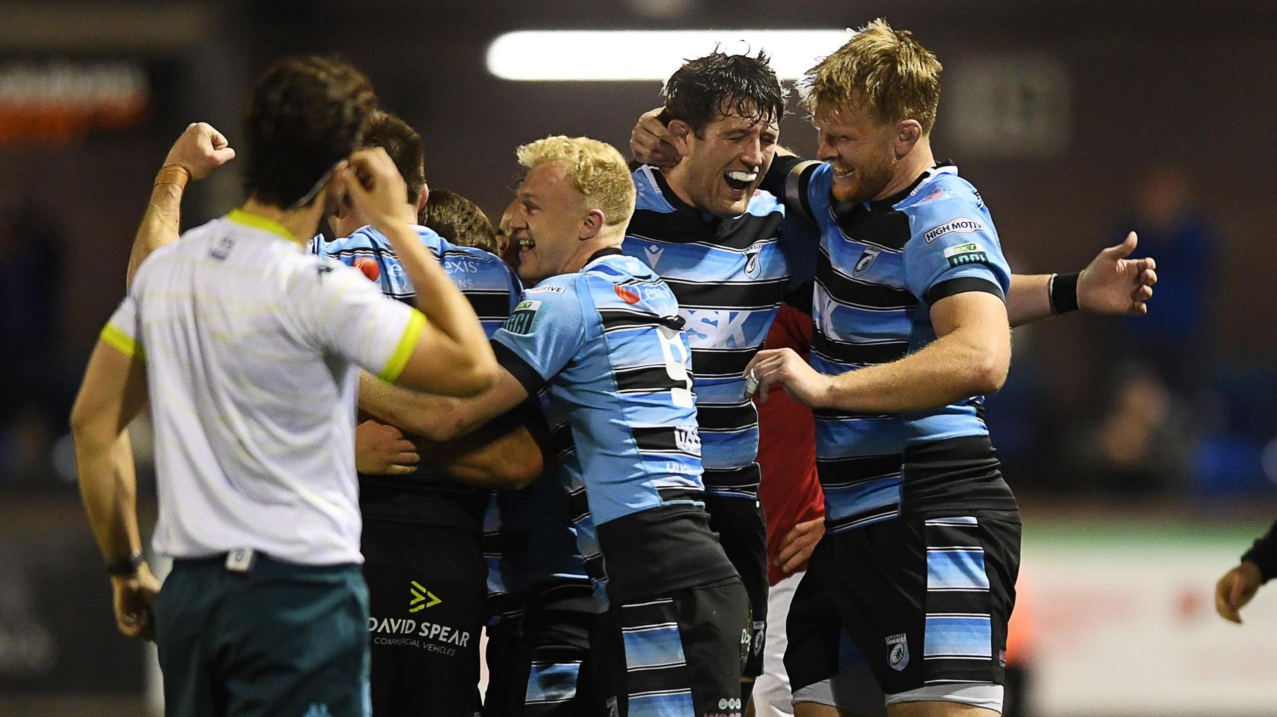 Cardiff celebrate a win against Munster at the Arms Park