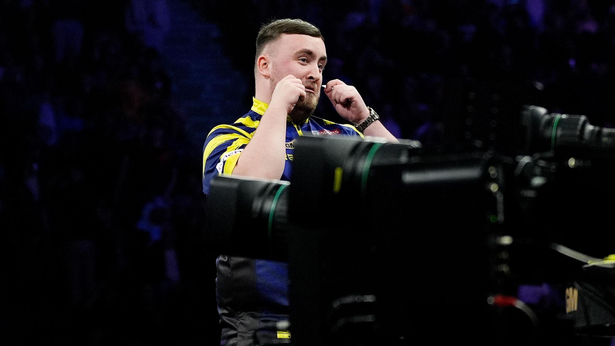 Luke Littler mimes 'cry-baby' during his Premier League Darts game against Gian van Veen