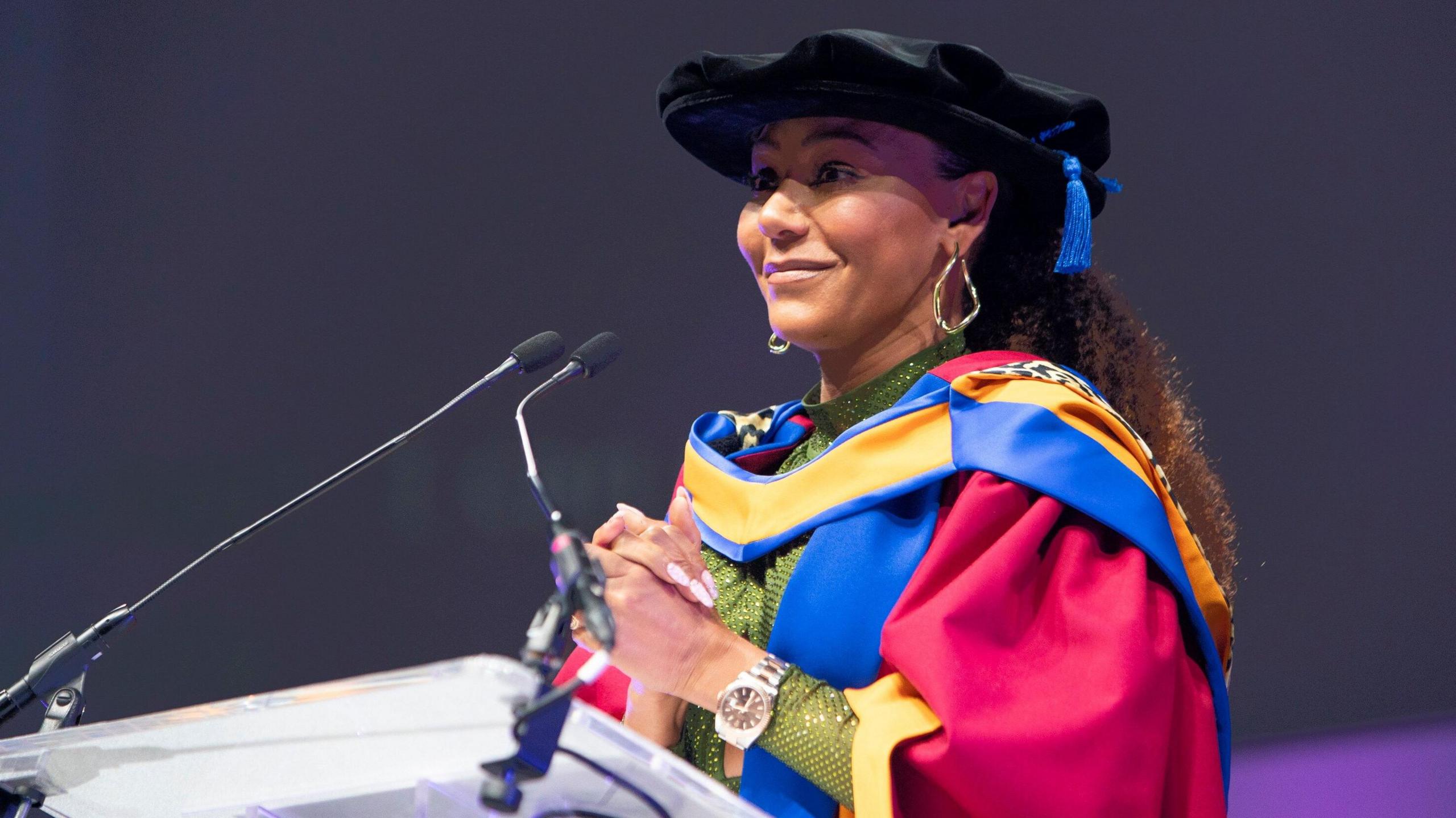 Mel B on stage at the graduation ceremony