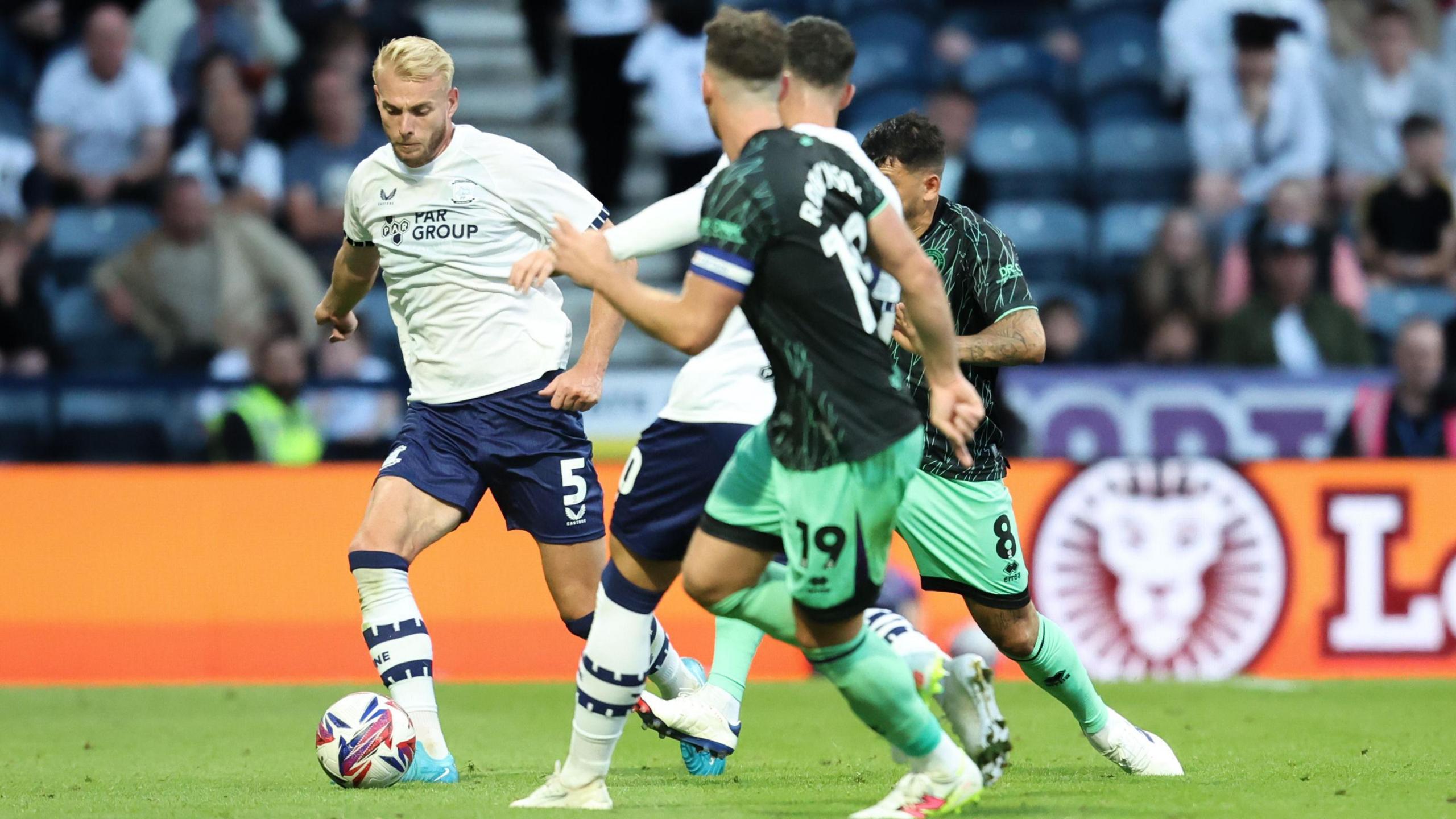 An action shot from Preston playing Sheffield United at Deepdale