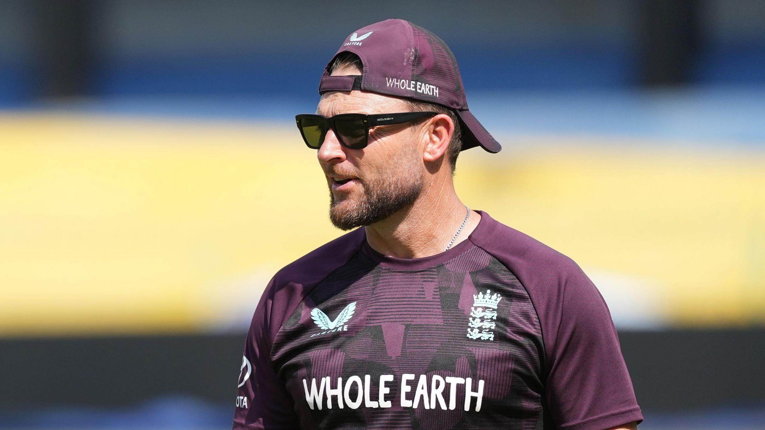 Brendon McCullum looks on during training