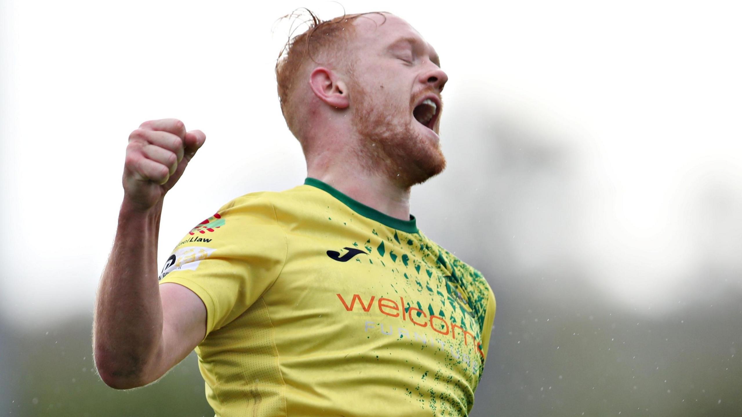 Sion Bradley celebrates during his time at Caernarfon