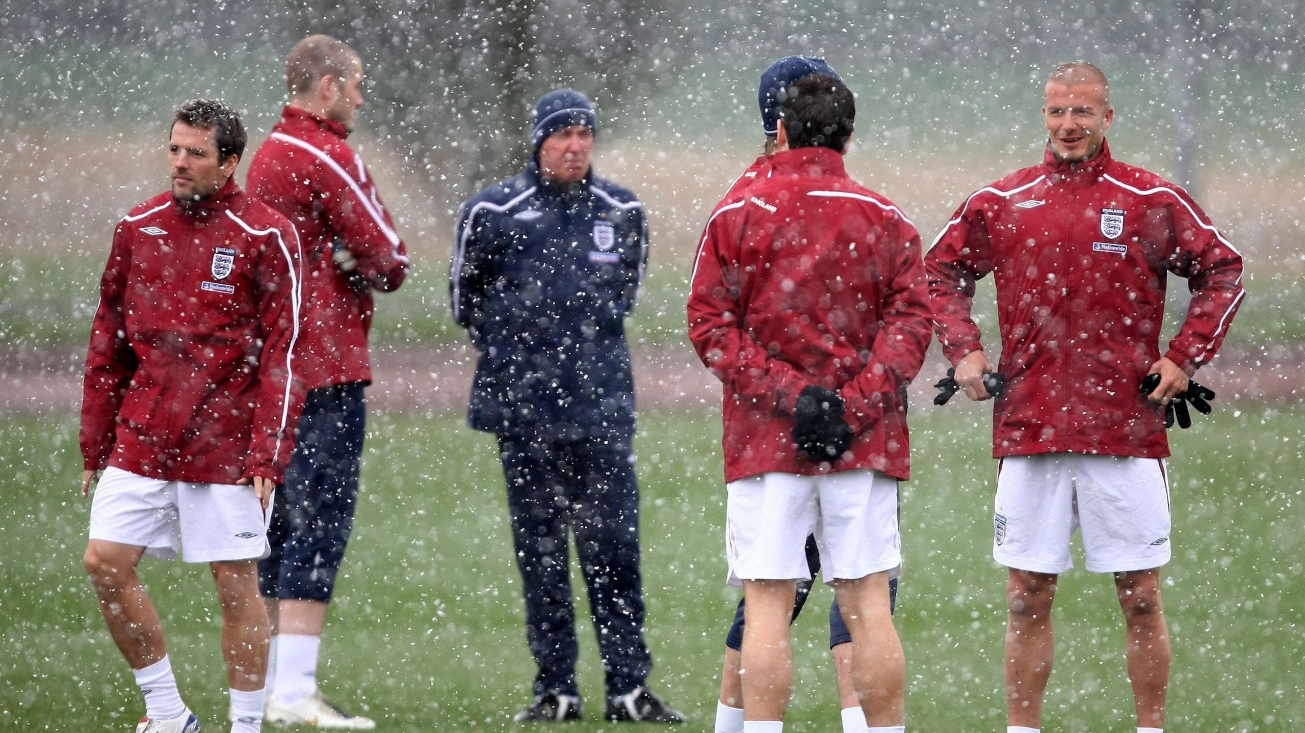Photo of the England national team training in the snow in 2008 – pictures are Michael Owen (L) and David Beckham (R) at London Colney.