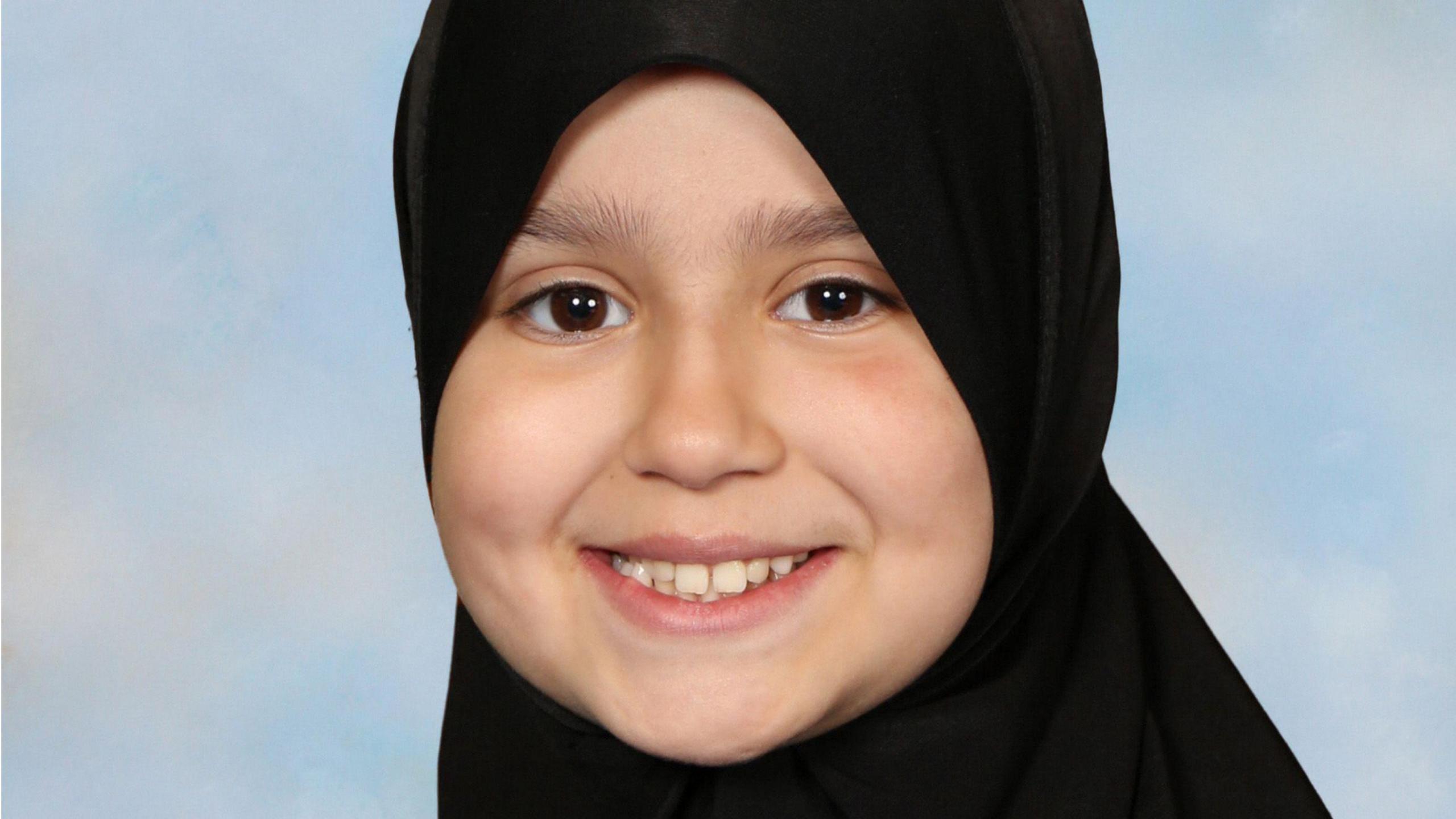 Sara Sharif wearing a hijab. She is smiling and looking directly at the camera. 