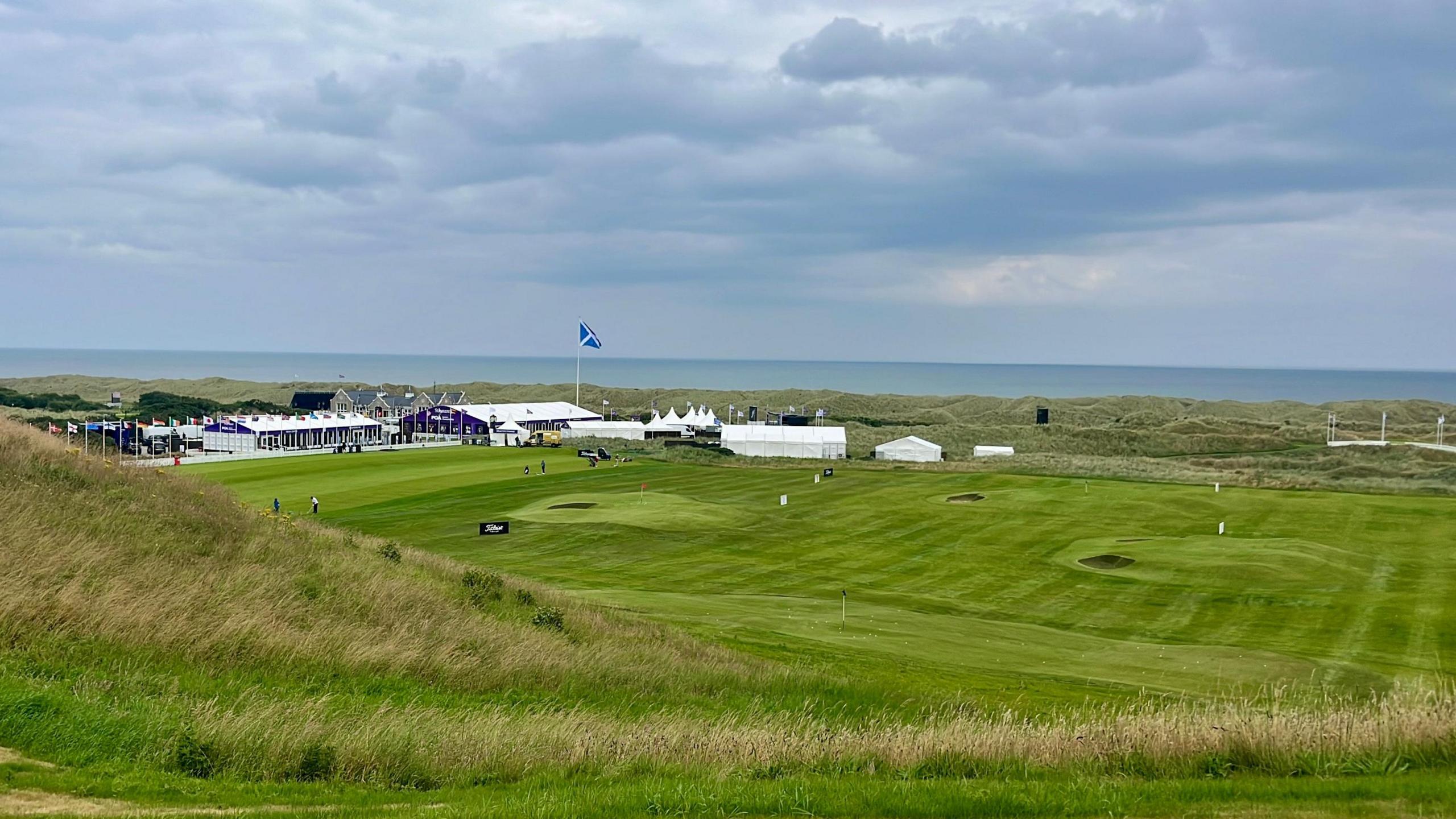 The links course at Menie, with flags flying and marquees erected, ahead of Trump's visit on Monday.