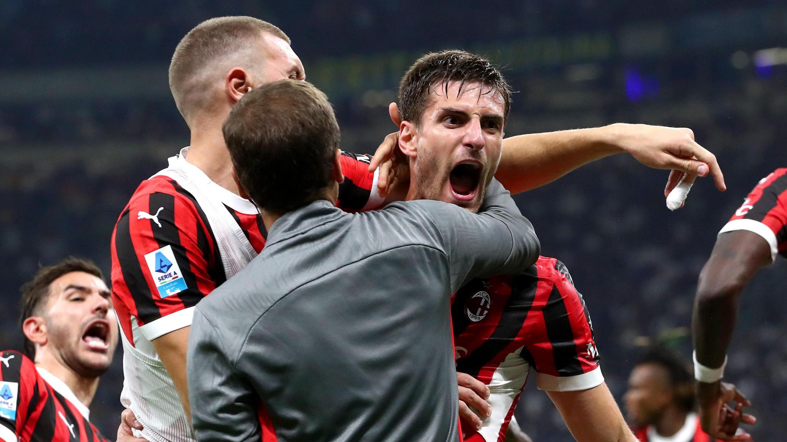 AC Milan defender Matteo Gabbia celebrates scoring a late winner against Inter in the Milan derby