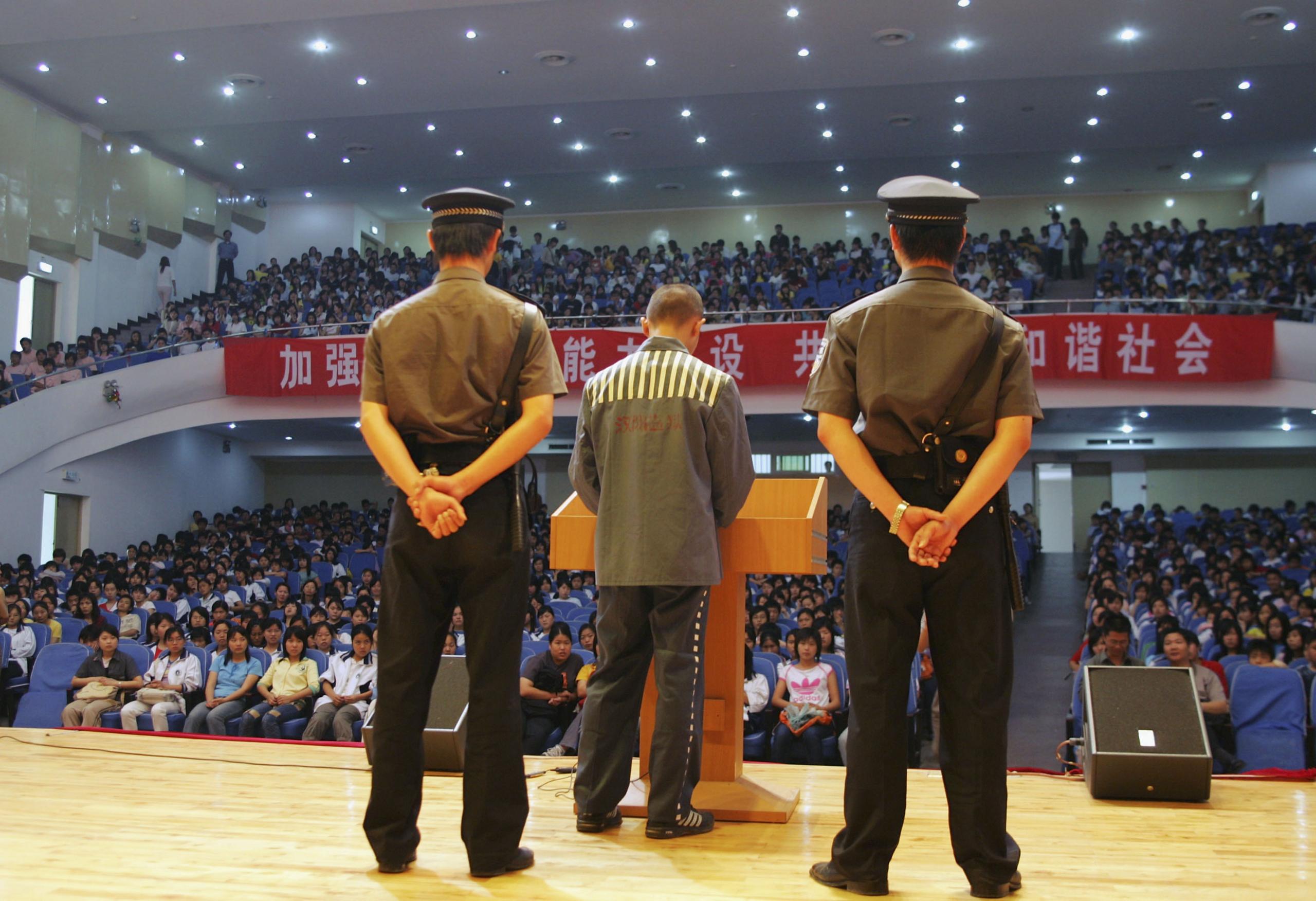 A young offender giving a speech at a school in China in May 2017