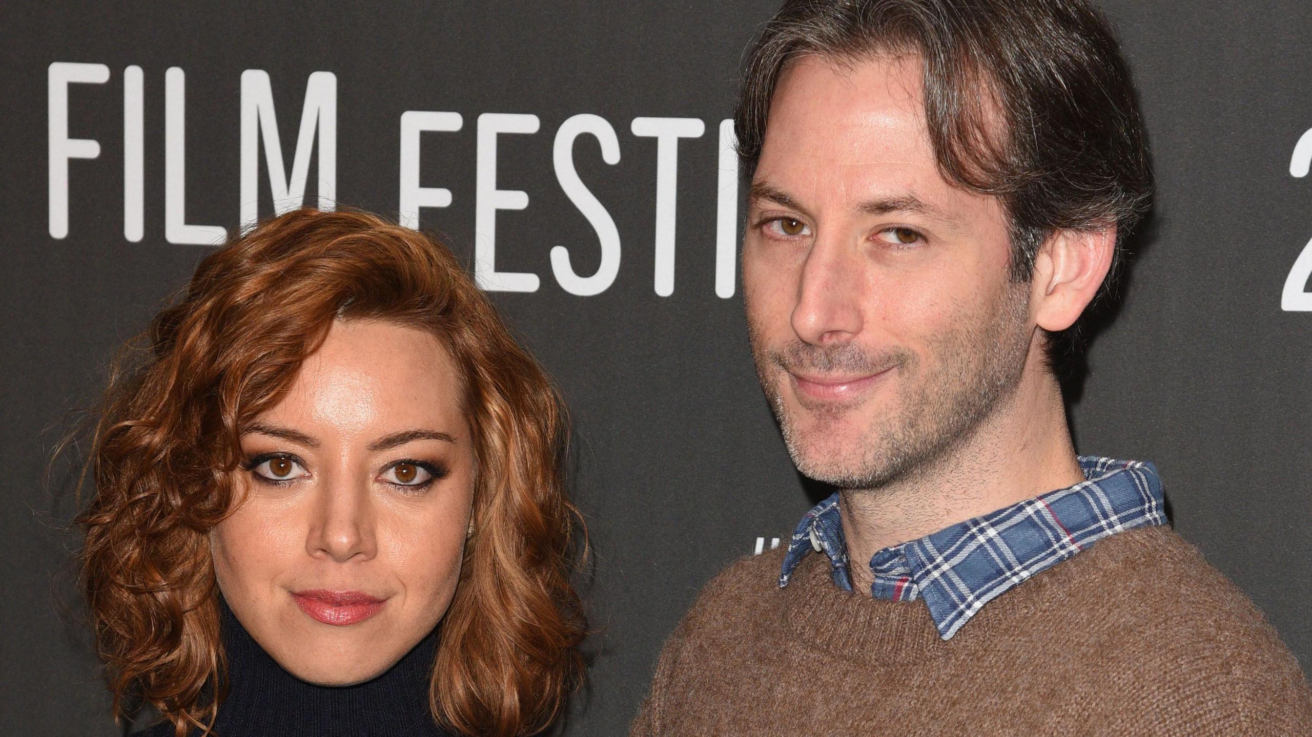 Aubrey Plaza and Jeff Baena standing together and posing for photos at the 2017 Sundance Film Festival